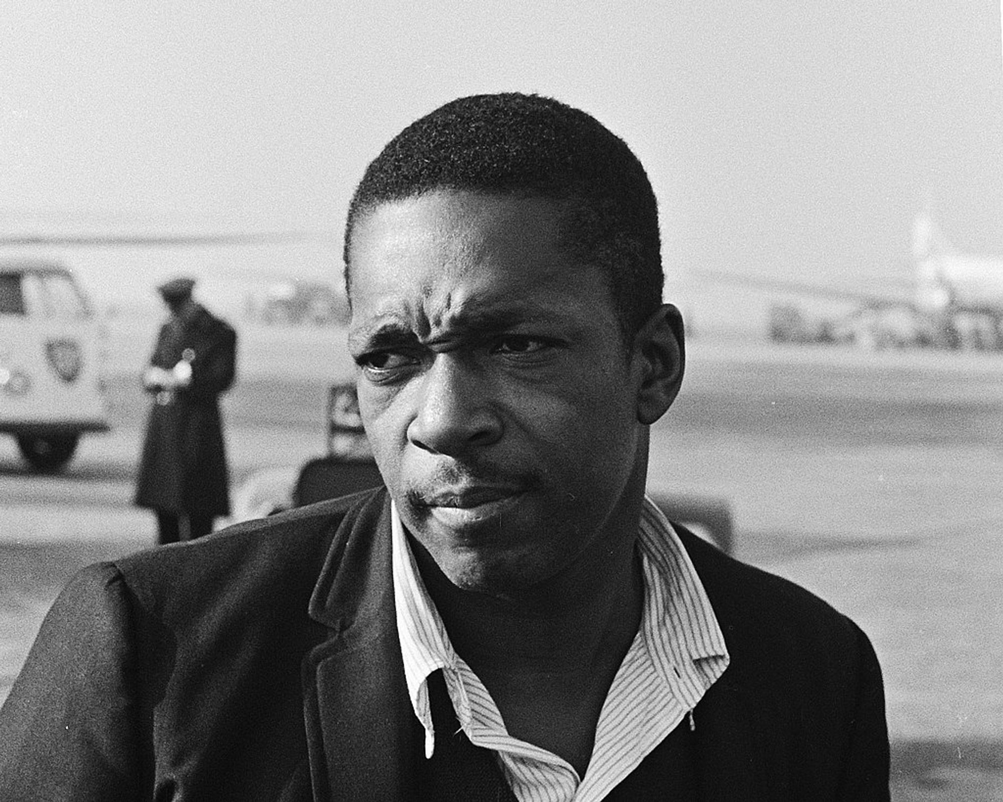 A black and white iamge of John Coltrane