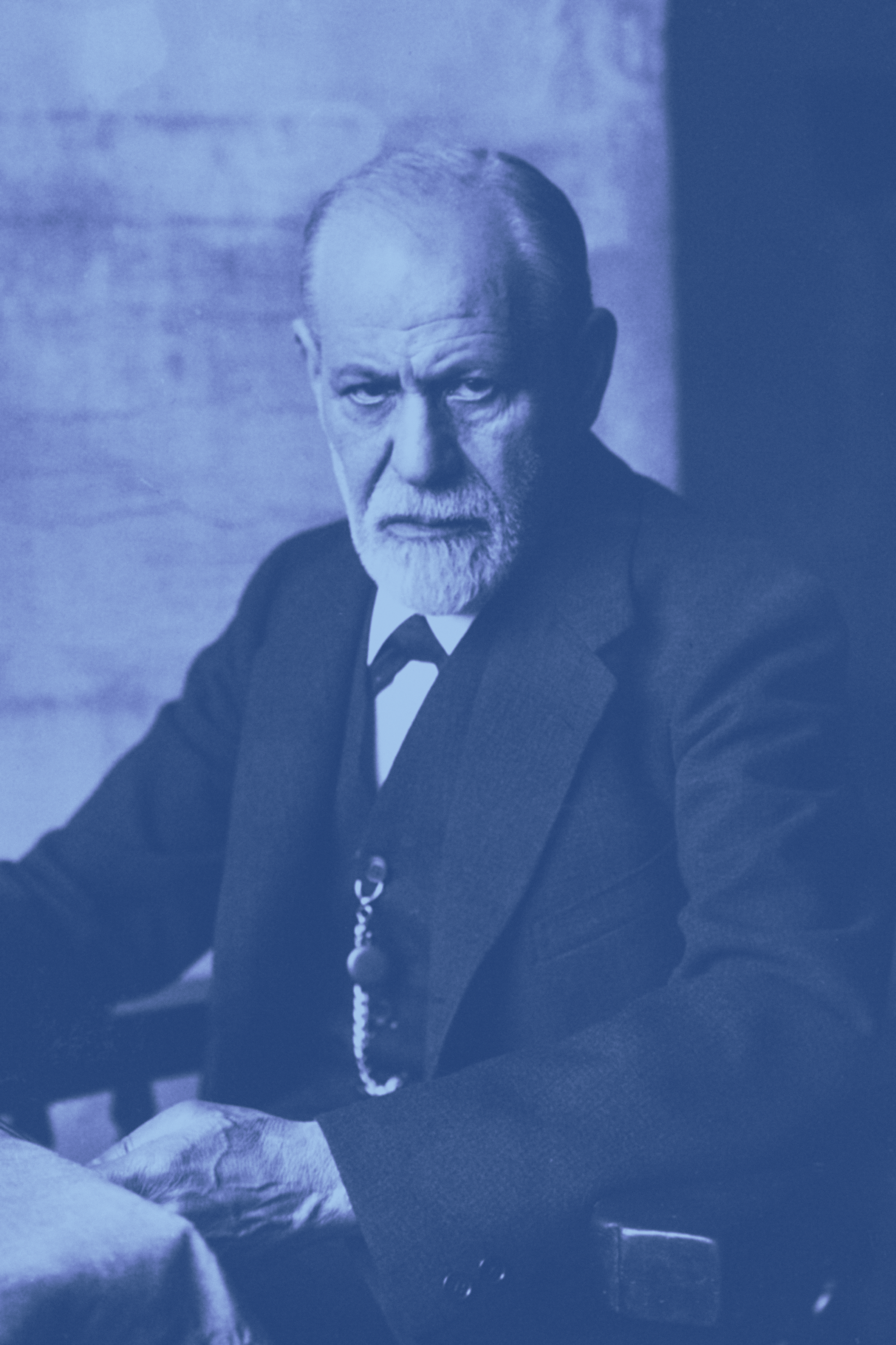 A black-and-white photographic portrait of Sigmund Freud