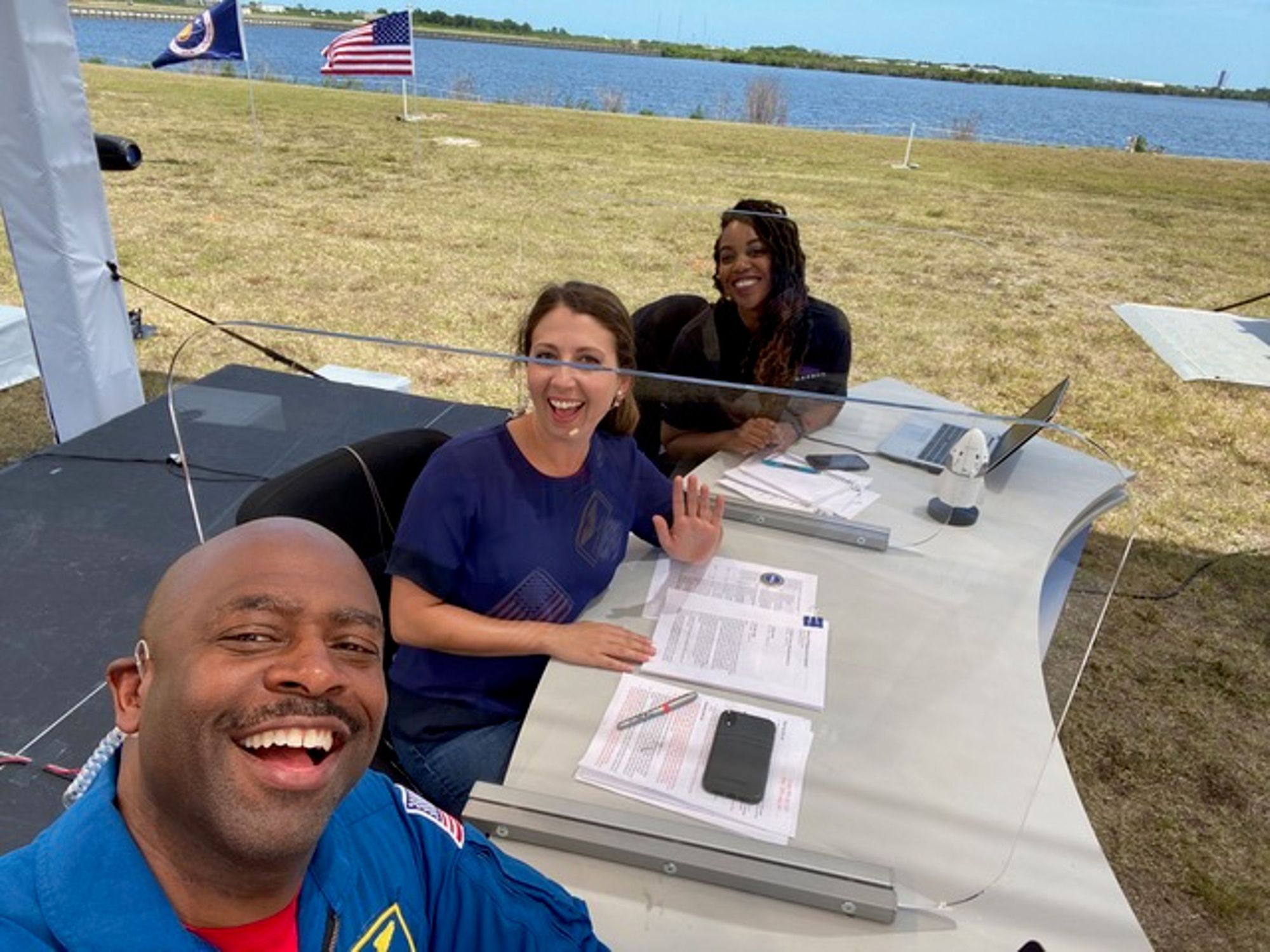 Leland and co-hosts at Kennedy Space Center preparing for NASA and SpaceX launch.