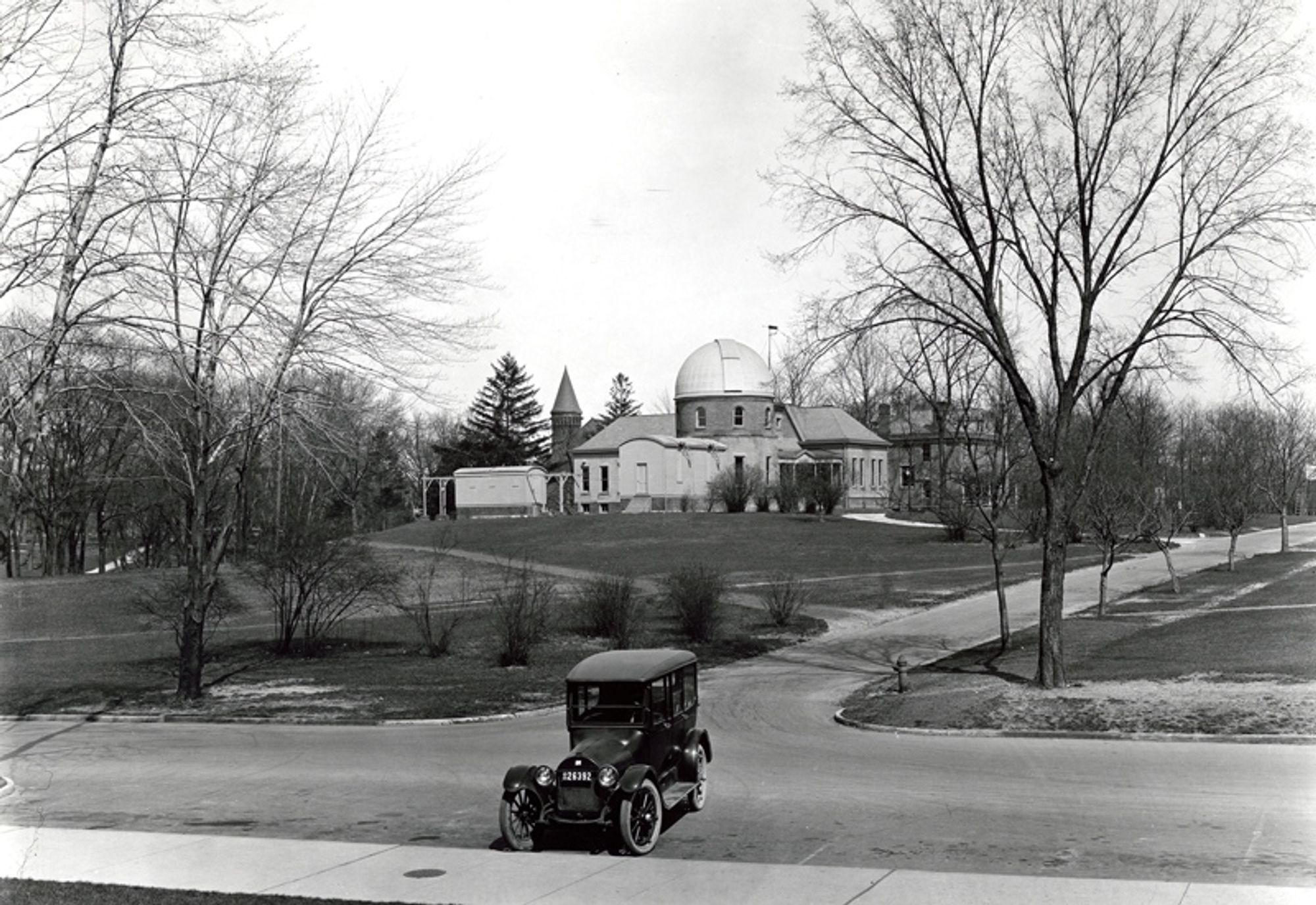 An old photograph taken of an observatory from afar.