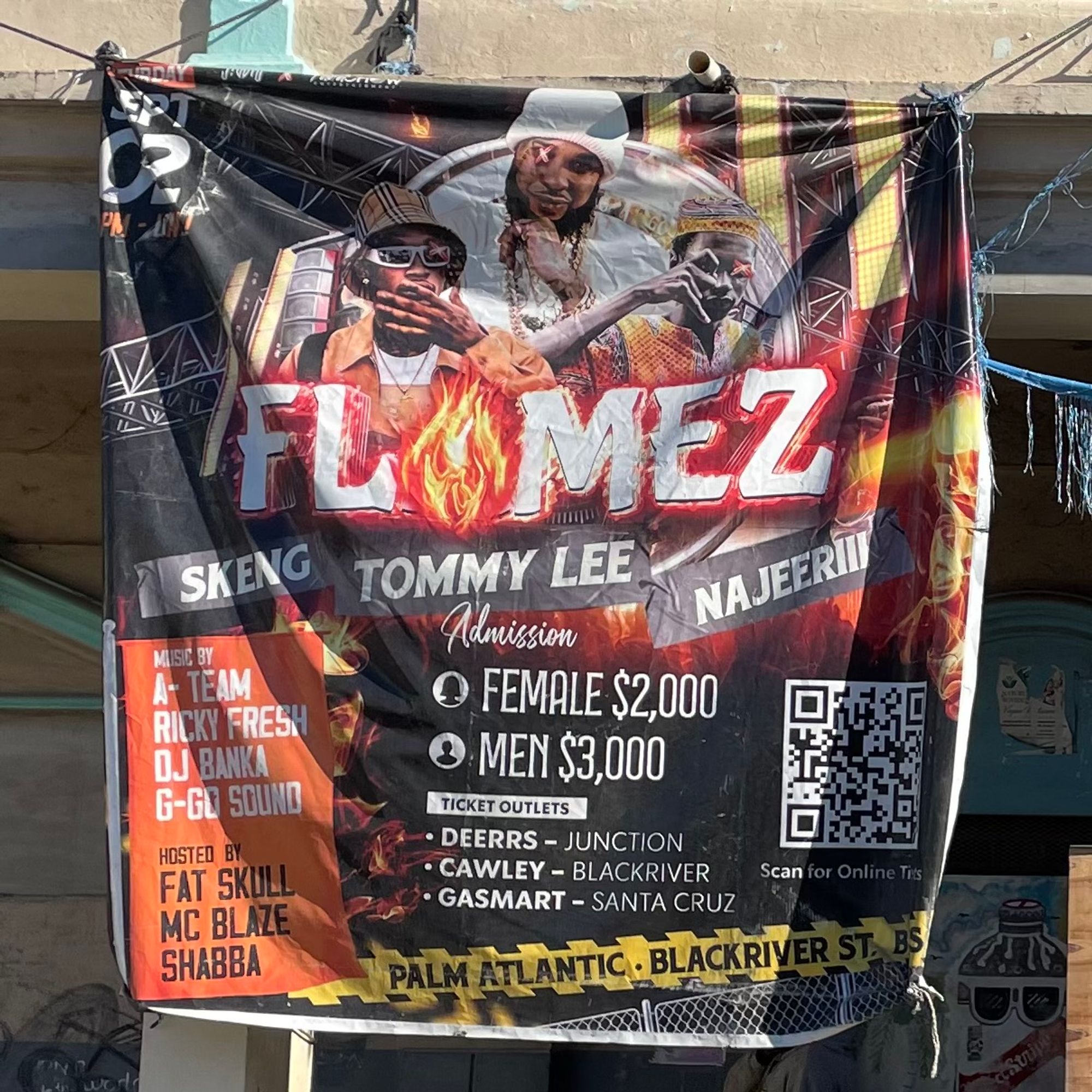 A gig banner that reads "FLAMEZ" with three figures across the top, labelled Tommy Lee, Najeeriii, and Skeng.