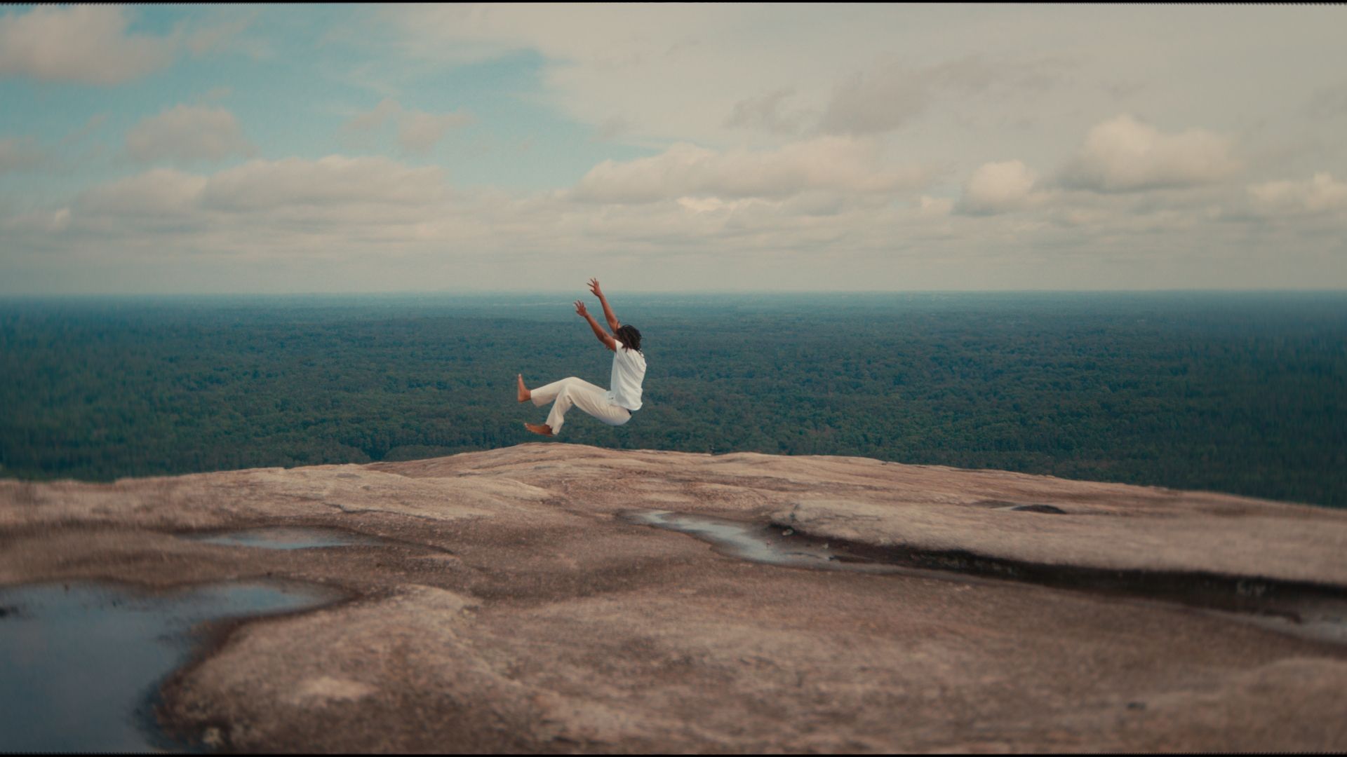 Landscape with a person falling