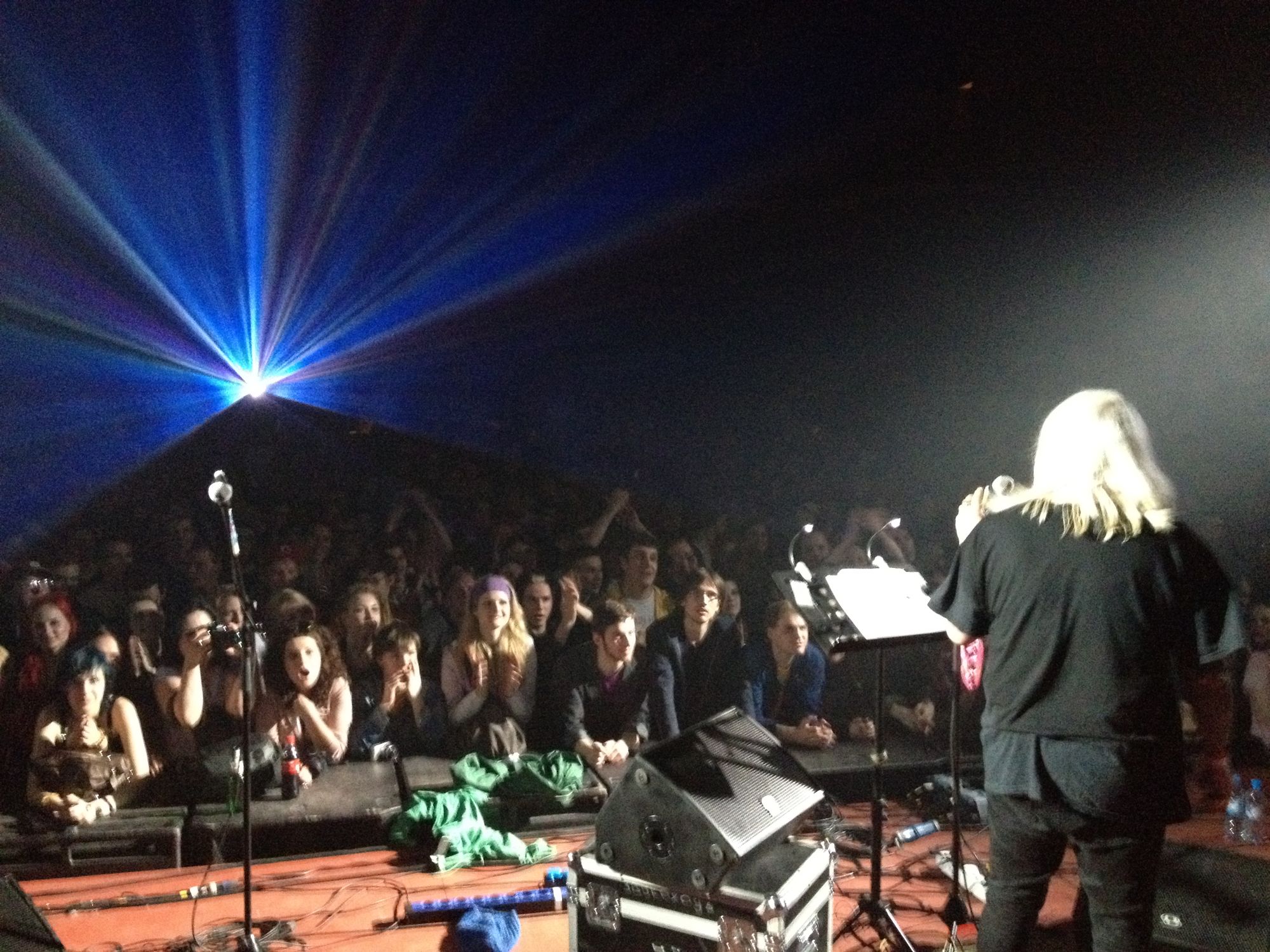 Person onstage in front of a crowd