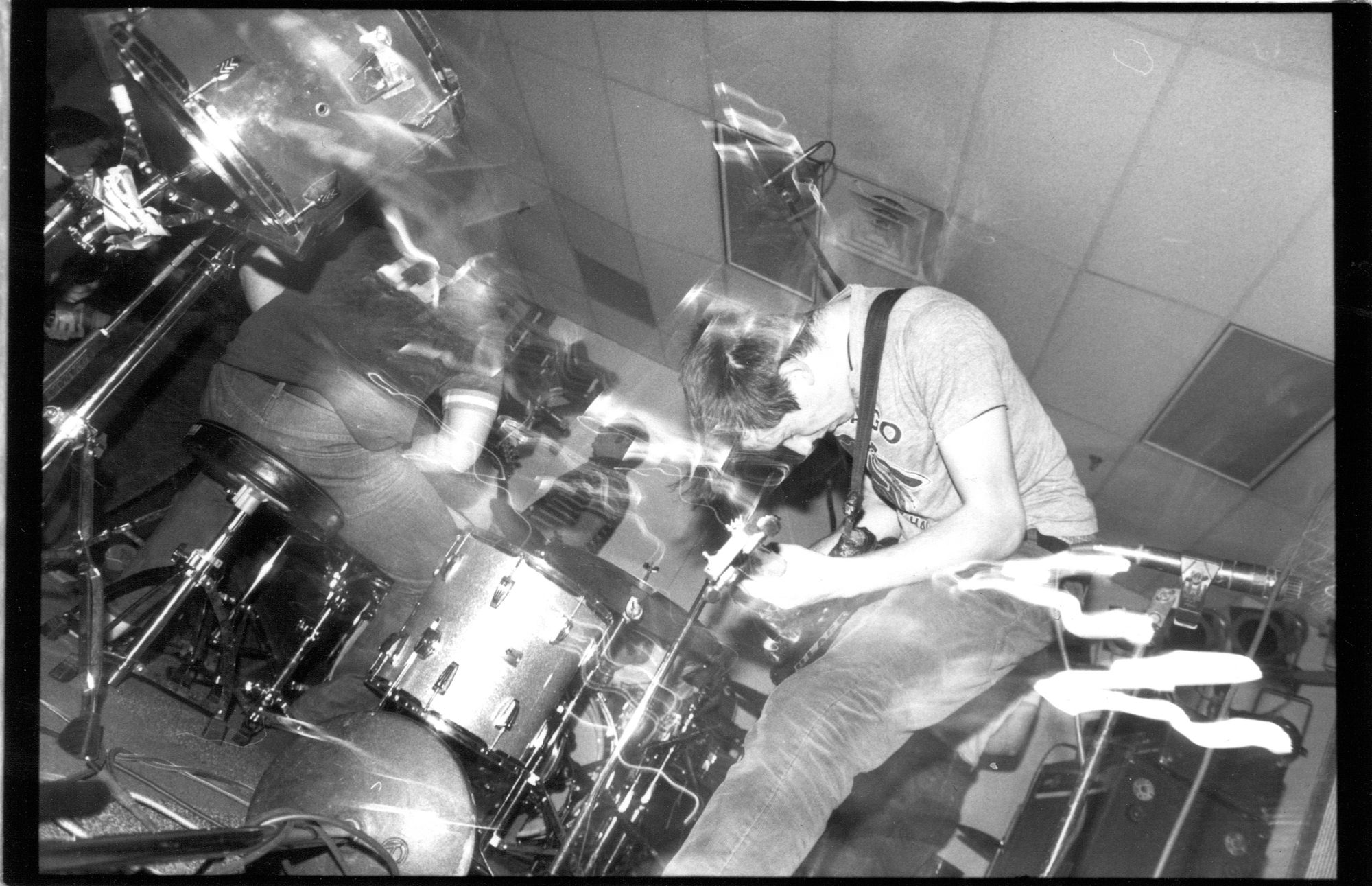 a photo of Daniel from Black Eyes playing guitar and rocking out