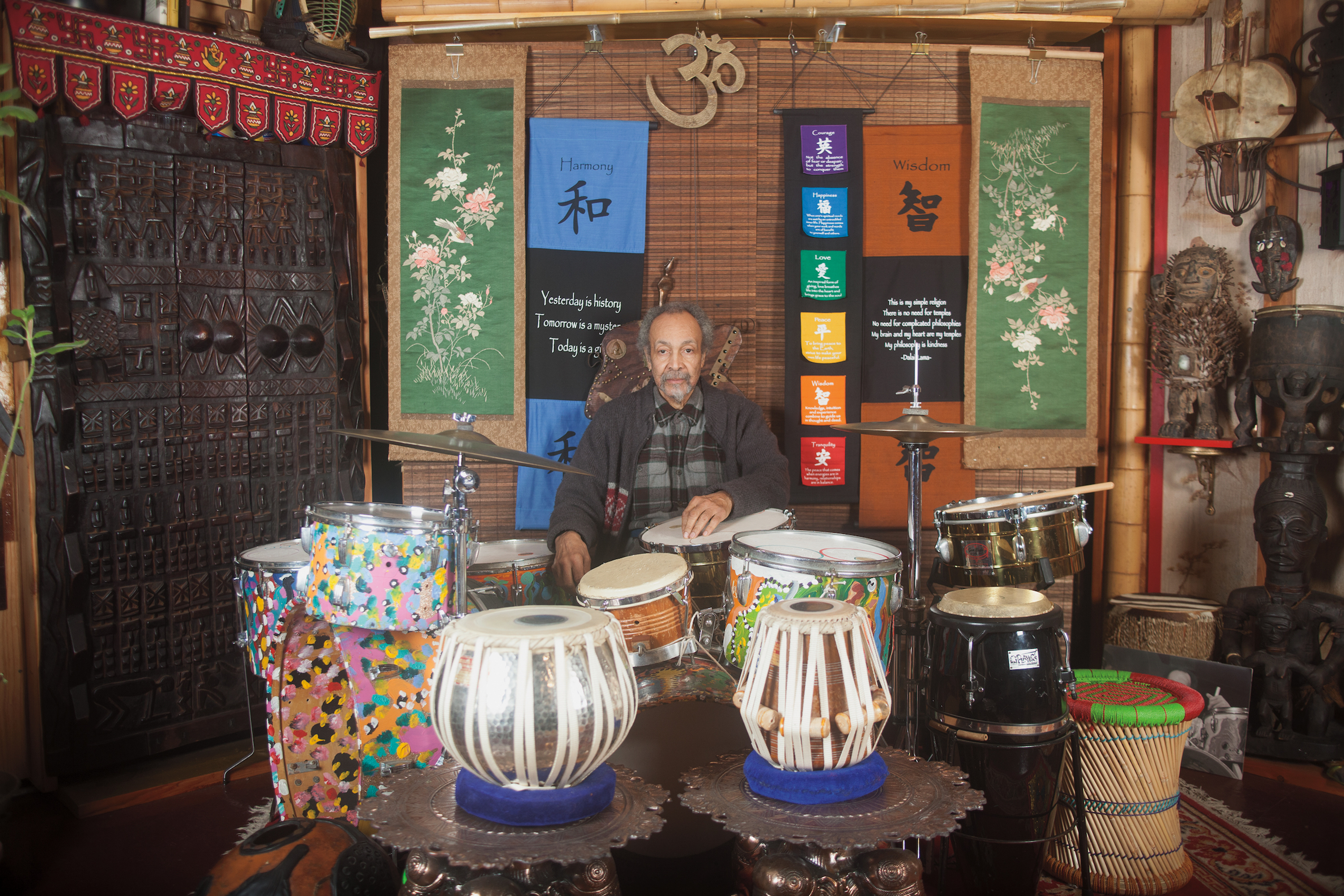 Milford Graves at his drum set in his practice pagoda studio