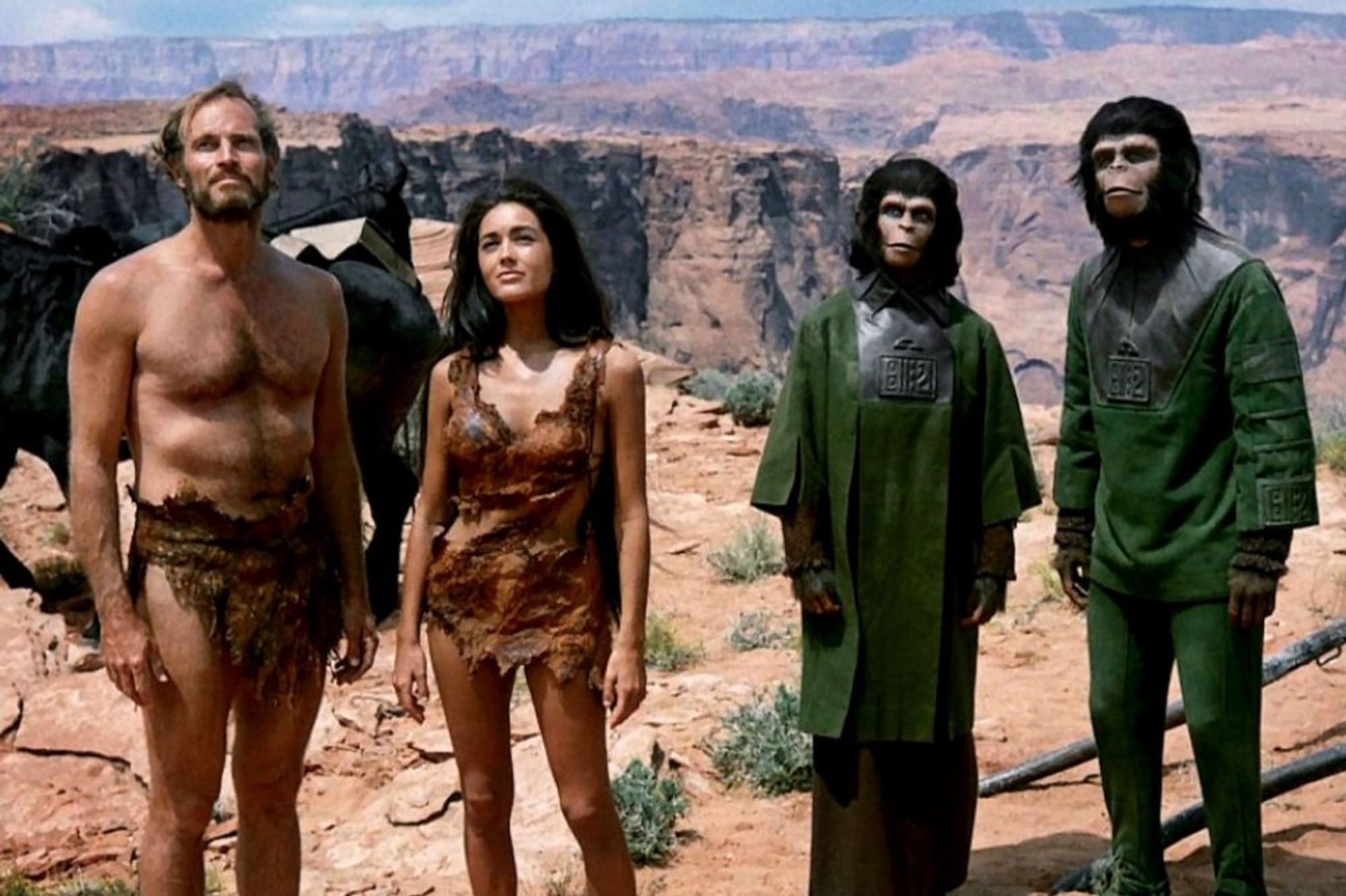 Photo of Charlton Heston, Kim Hunter, and two of the "apes" from Planet of the Apes.