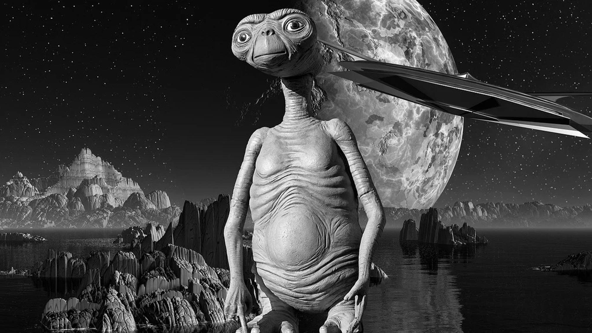 A black-and-white photograph of E.T. against a martian landscape.