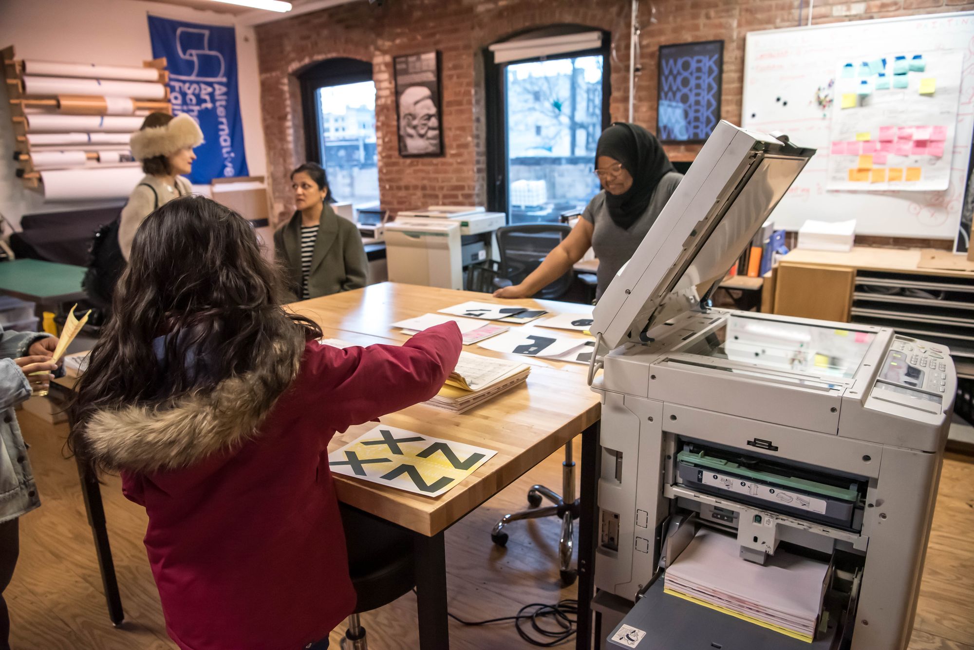 Vistors learn about risograph printing in the Design Lab.