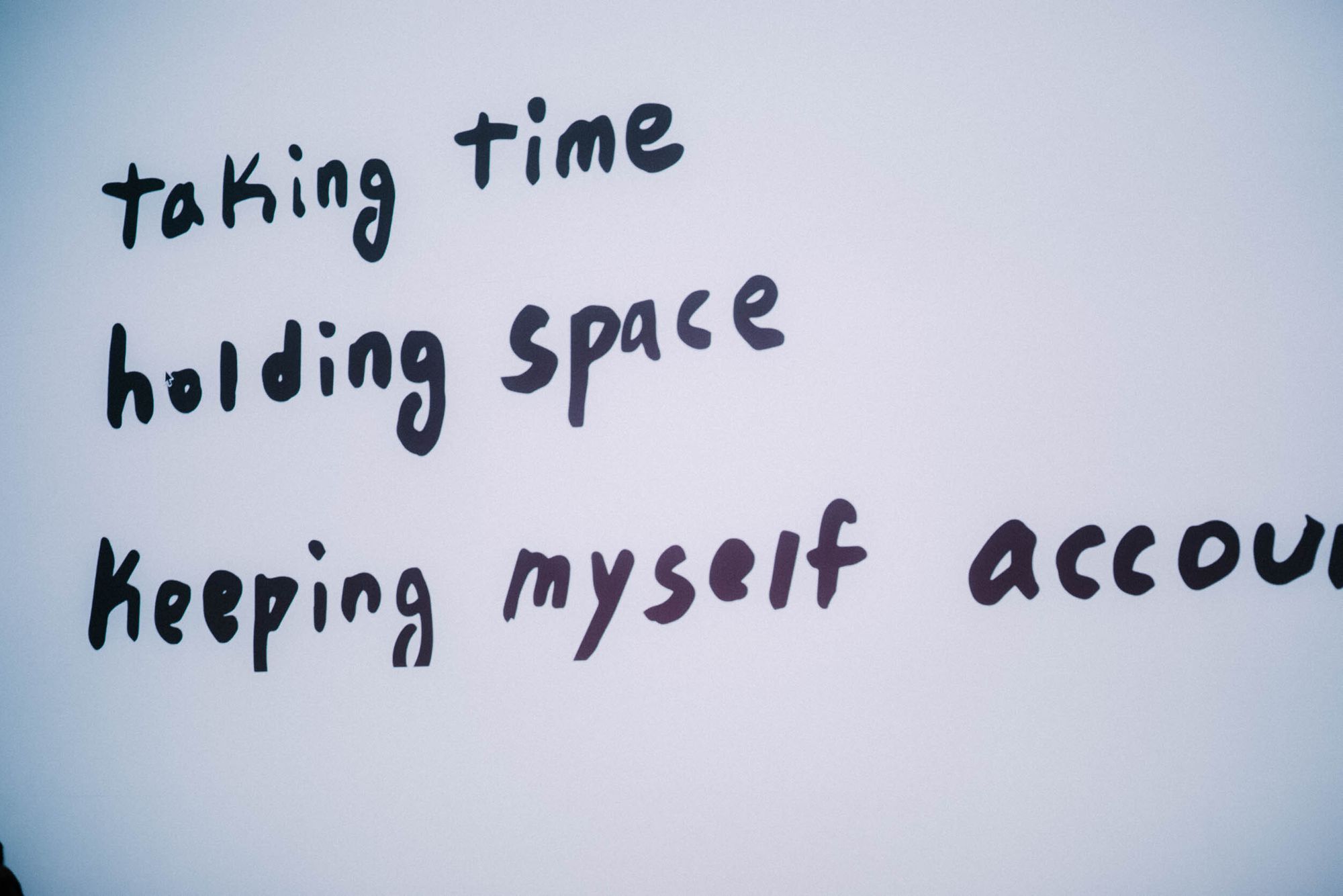 Black writing on a grey background says, "taking time, holding space, keeping myself accountable."