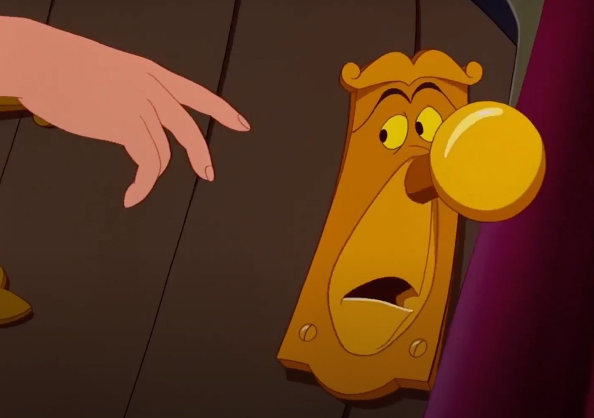 A hand reaching for an anthropomorphized door knob