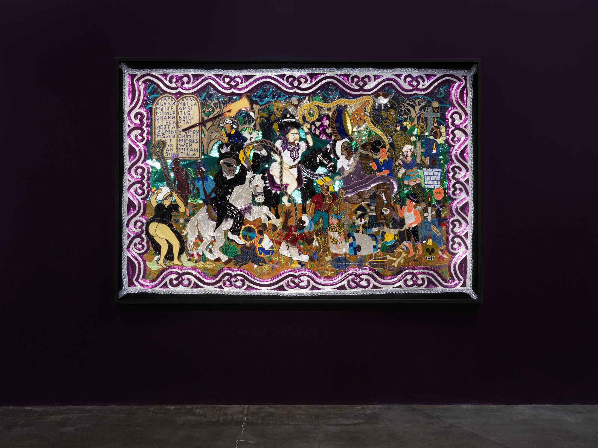 A colorful, sequined tapestry against a dark background