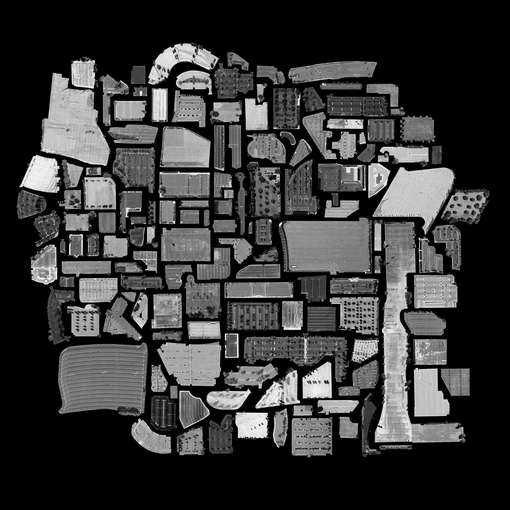An aerial view of 144 parking lots in black and white, collaged to fit perfectly together.