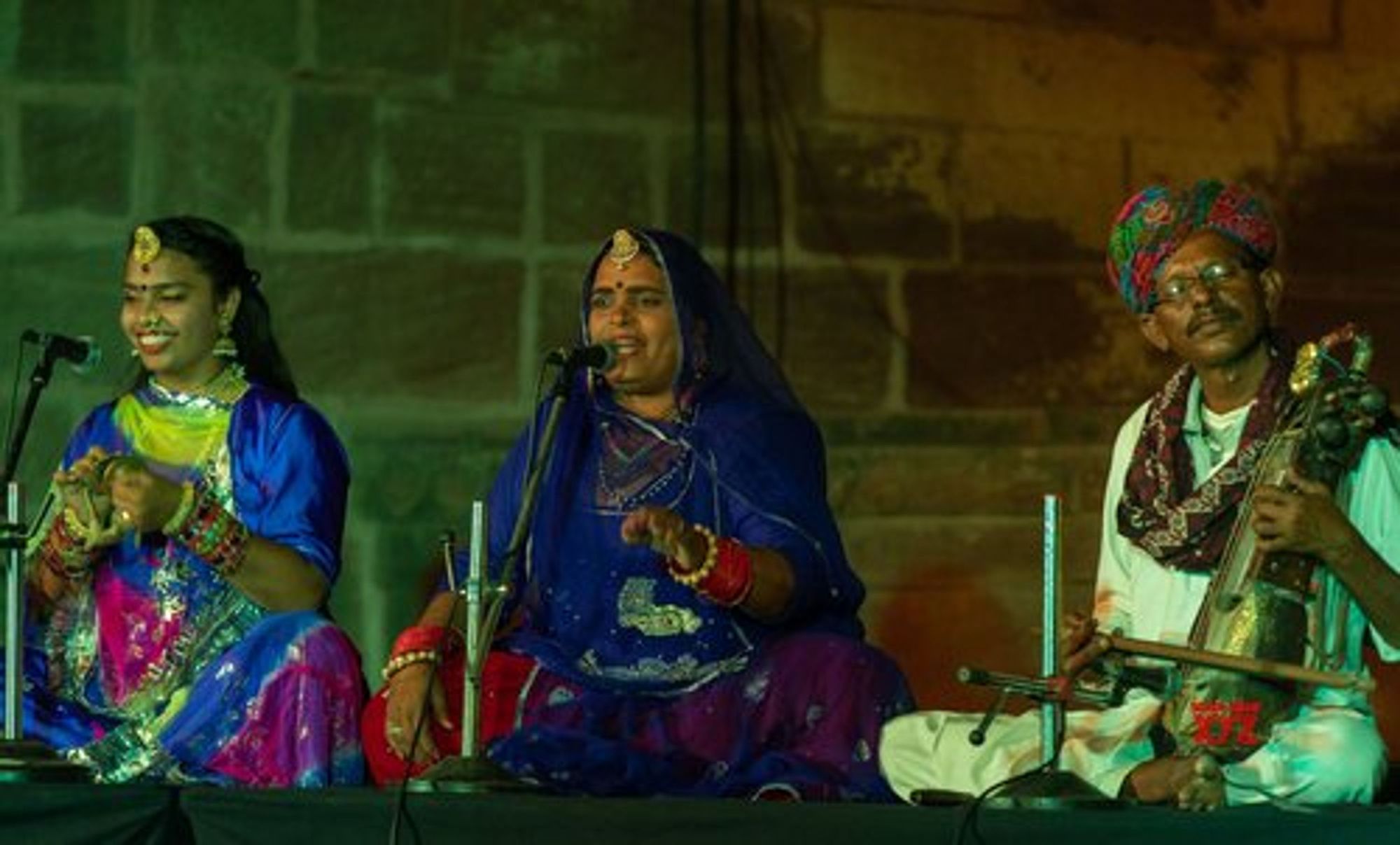 Womanly Voices (of Jodhpur Riff), three musicians sitting and playing