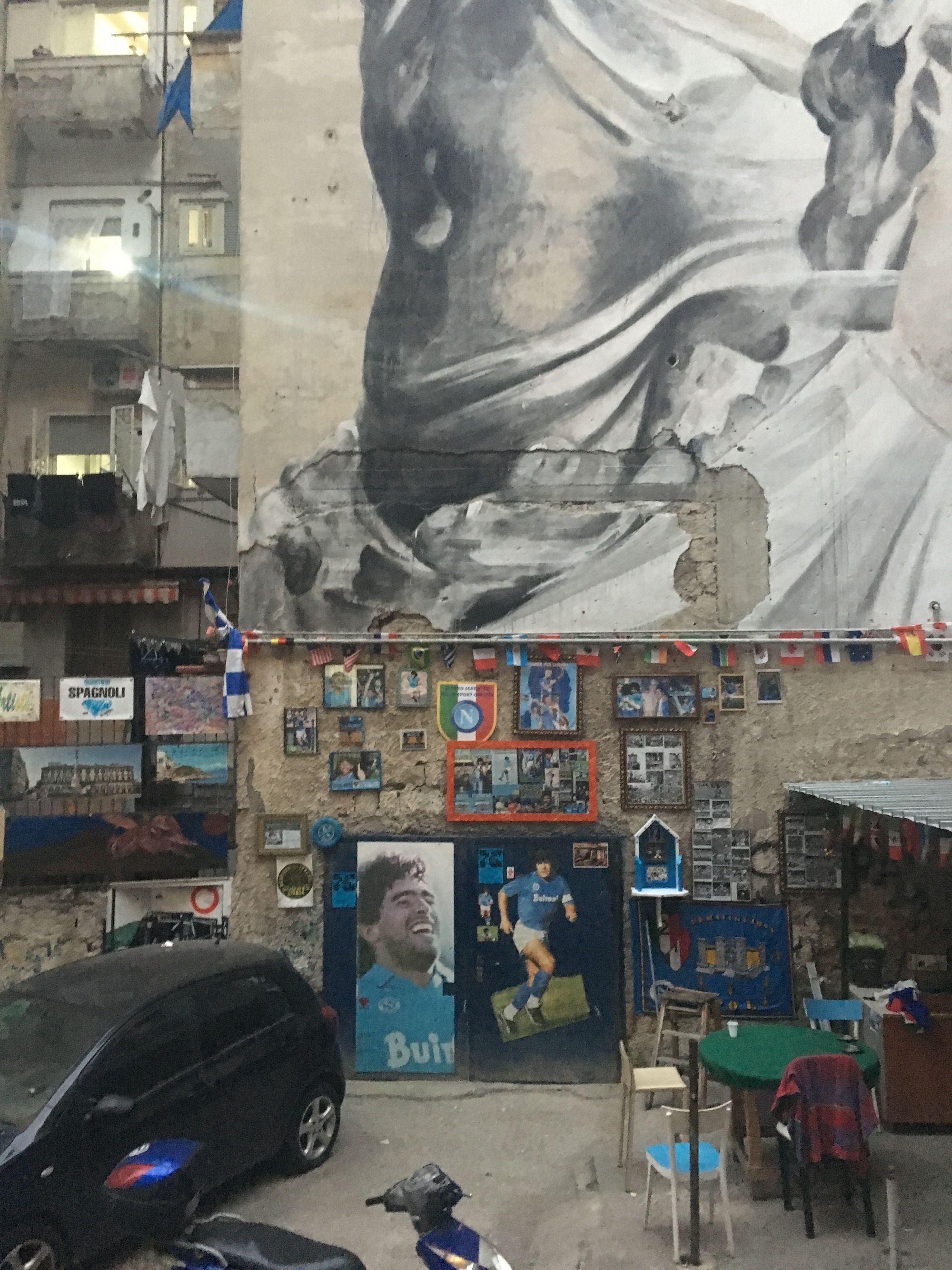 Maradona mural and shrine in Naples. Photographs by author
