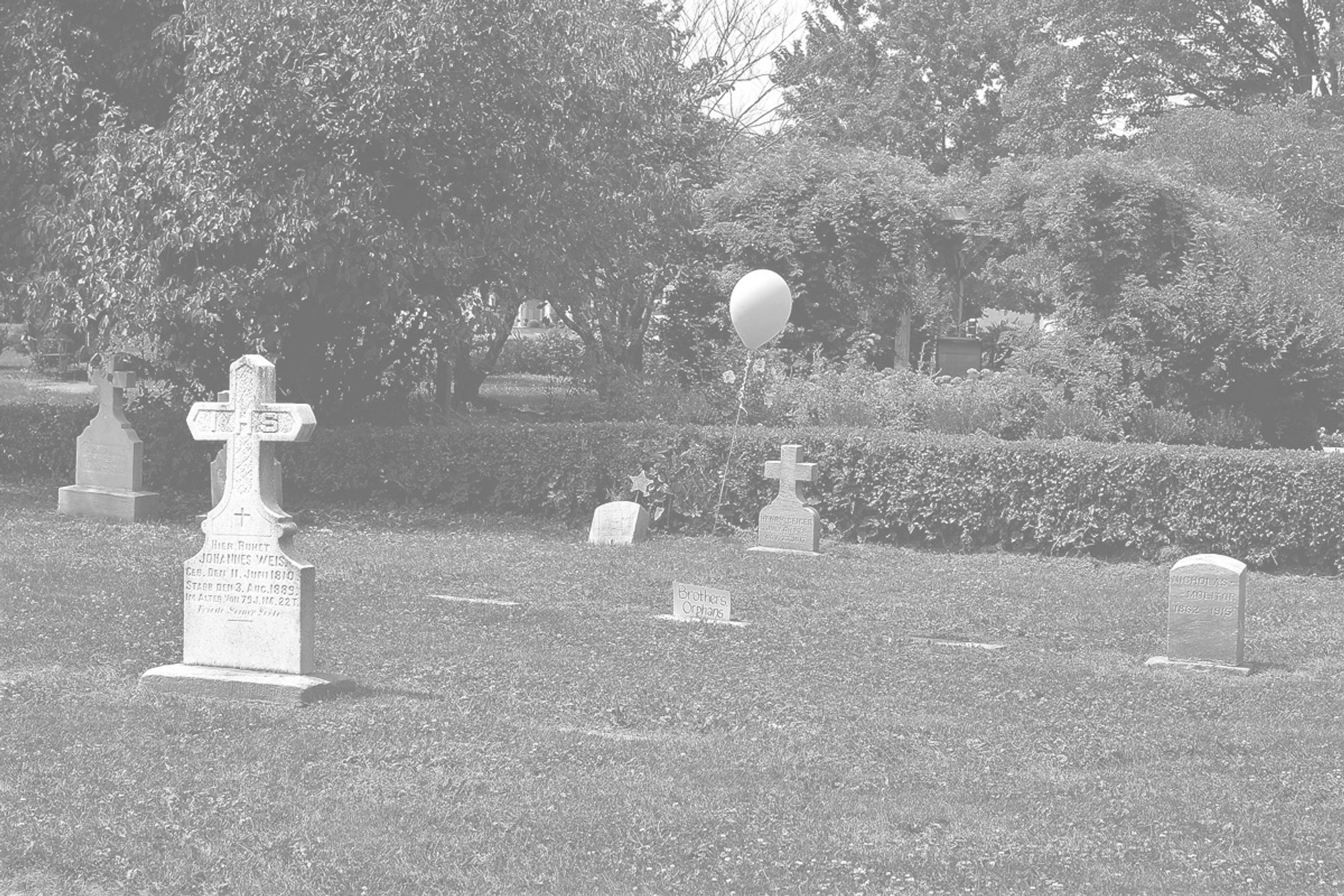 A cemetery in greyscale