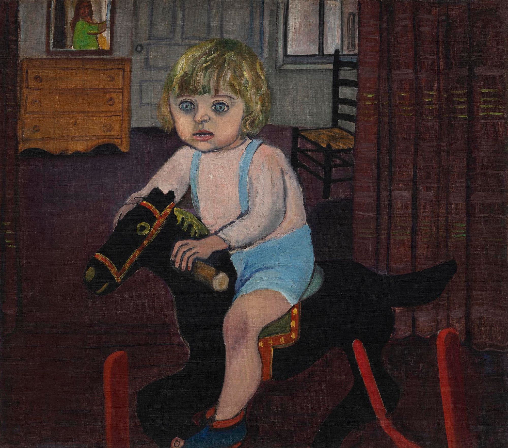 A child with wide, almost fearful eyes rocks on a rocking horse.
