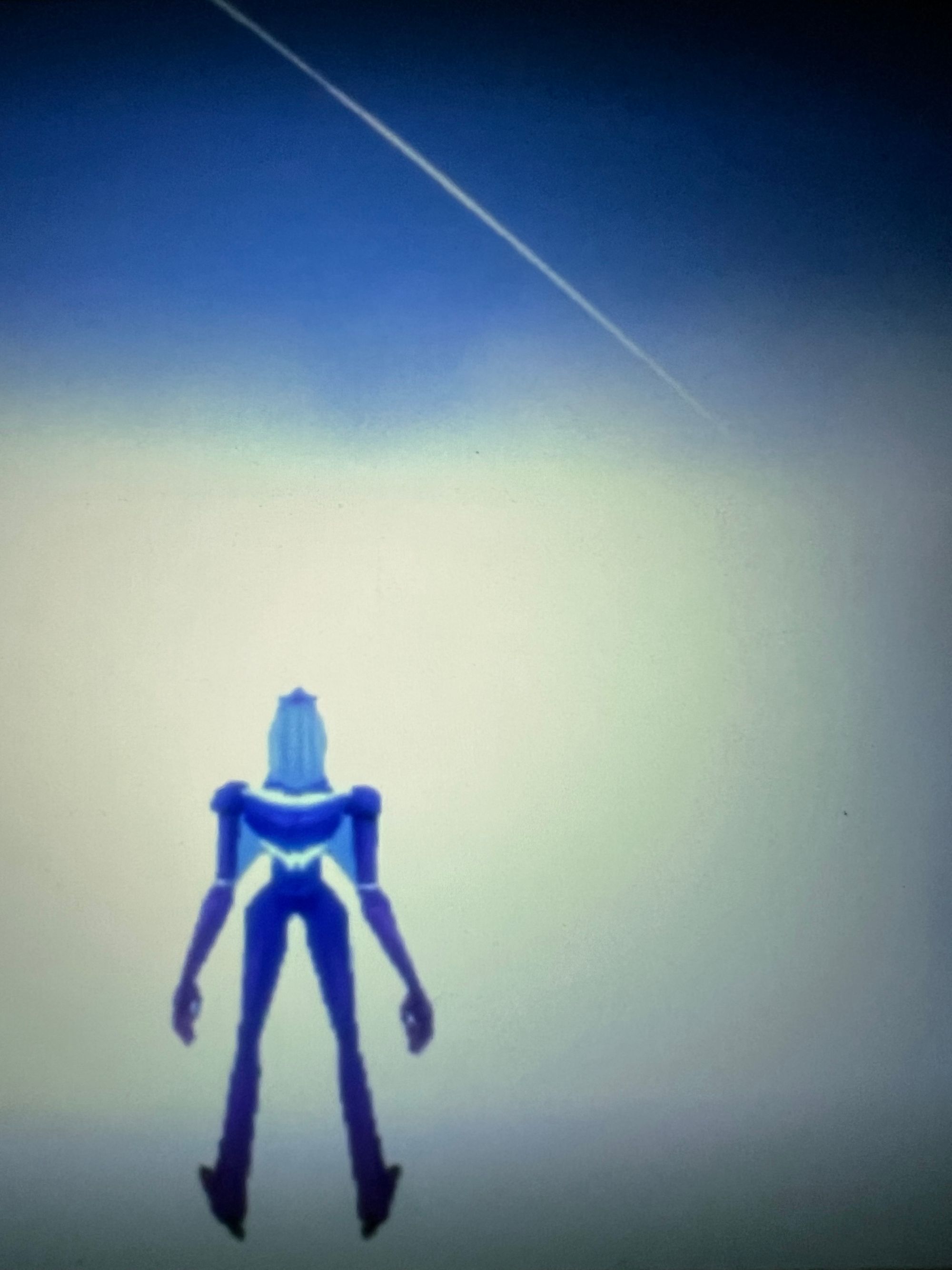 A video game character hovers in a foggy, sky-like landscape.