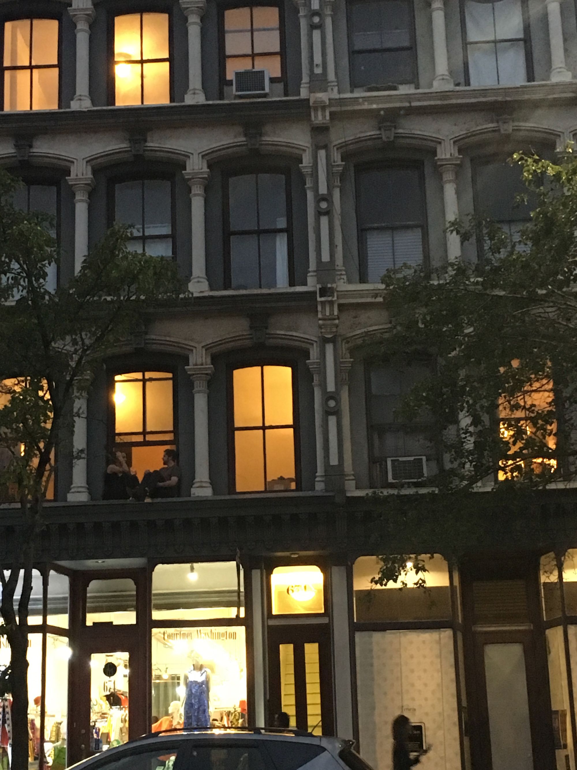 Photo of a New York City apartment's windows from the outside.