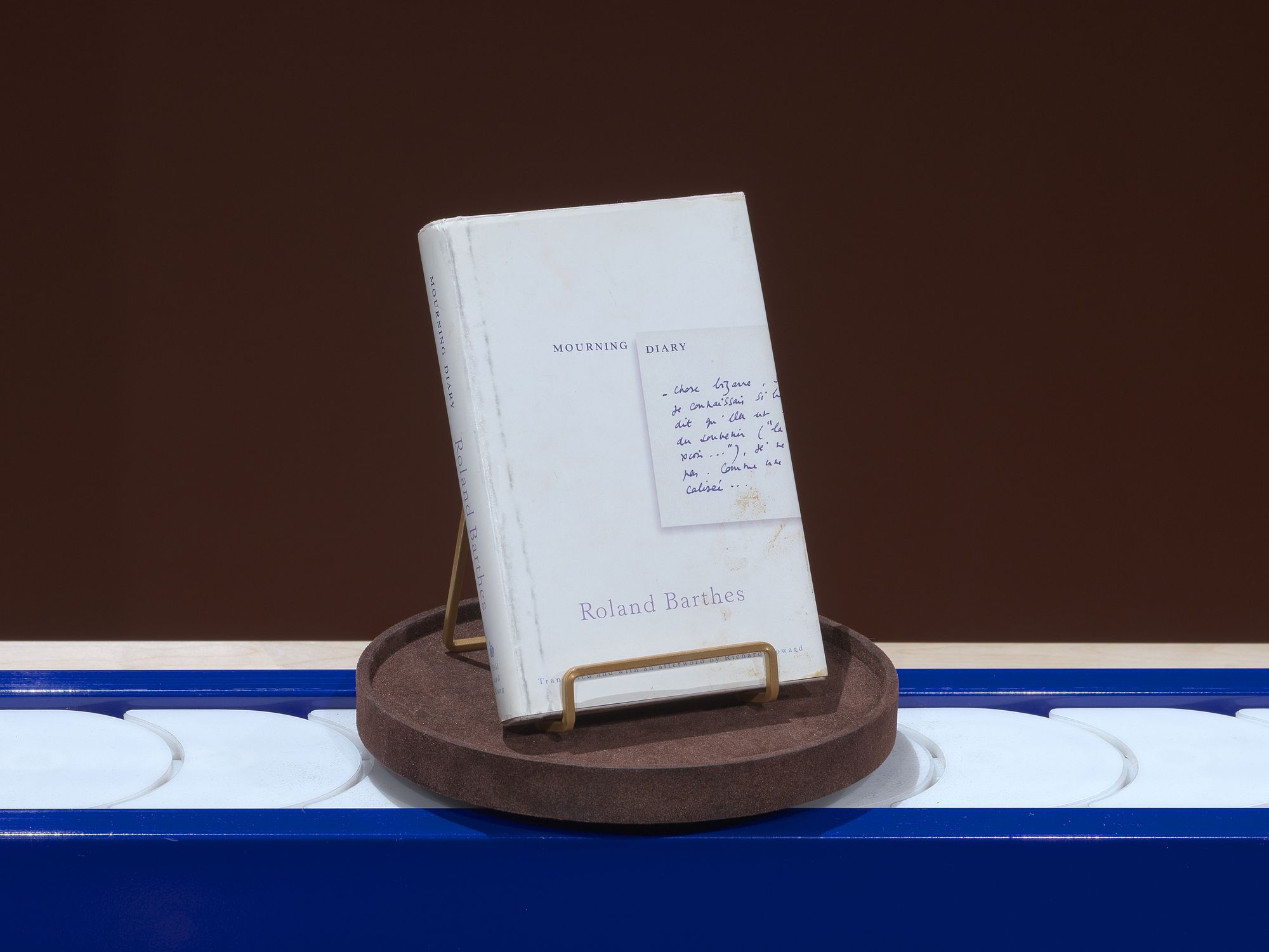 A book floating on a conveyor belt