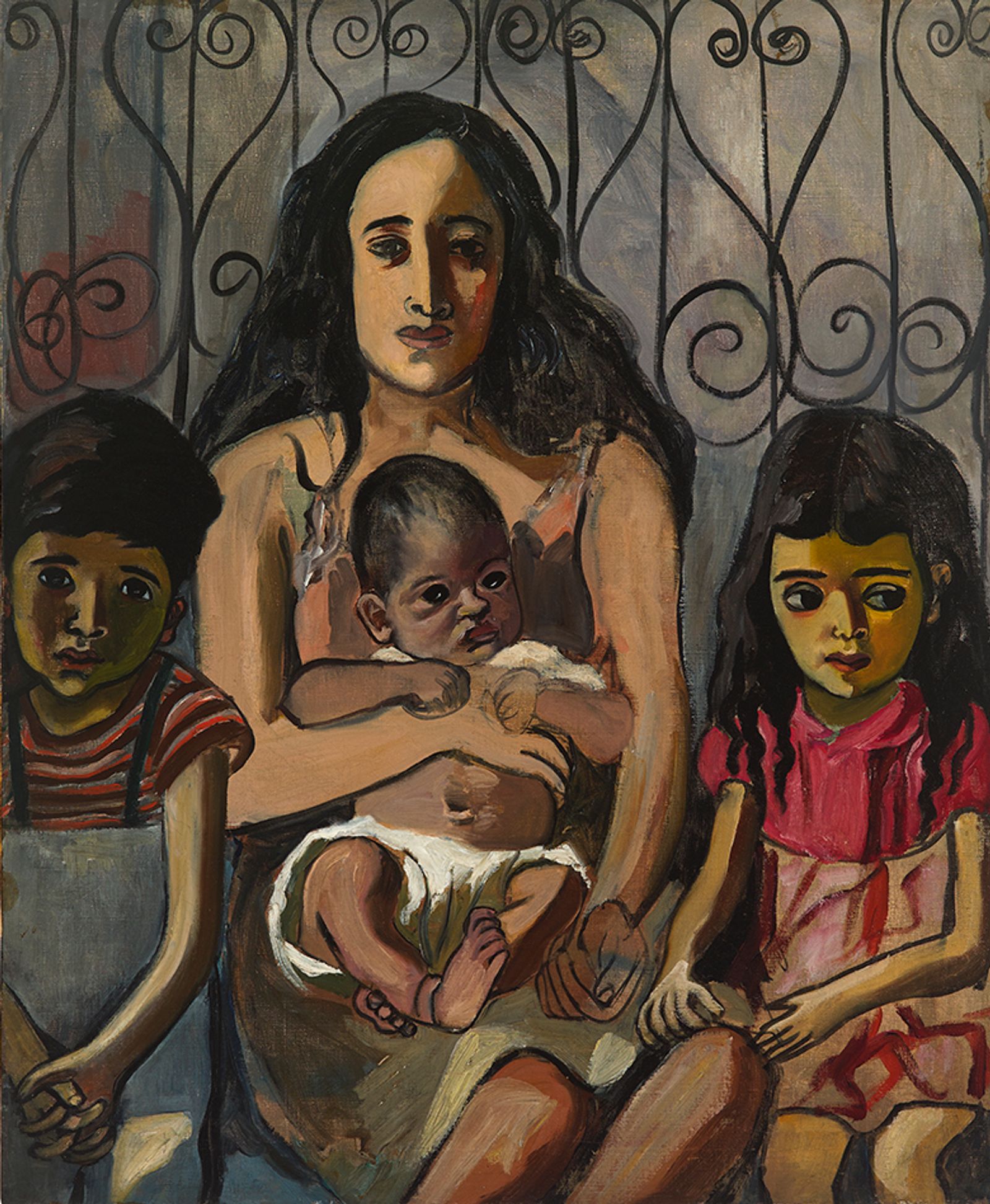 A woman holds a baby flanked by two small kids.