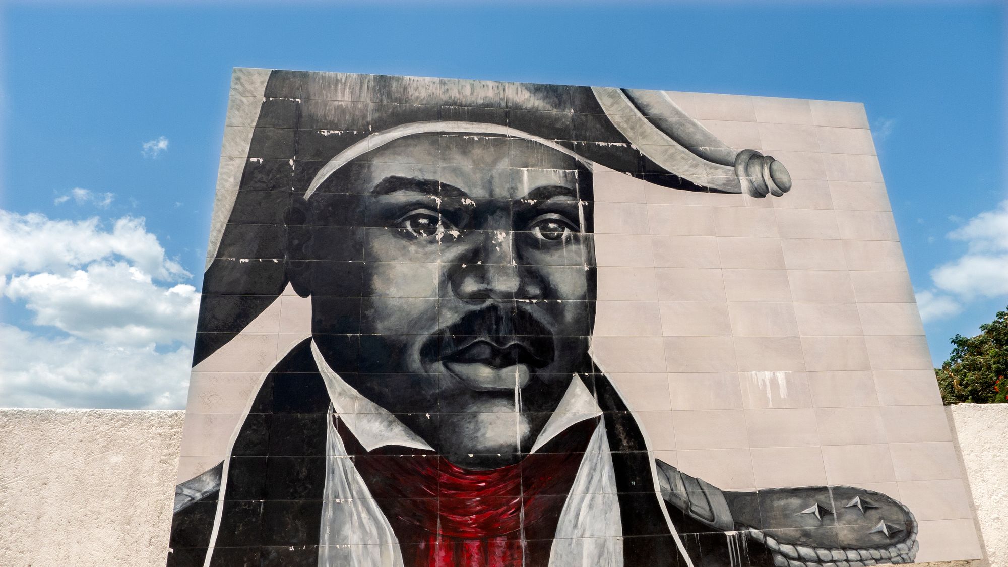 A large mural depicting Dessalines 