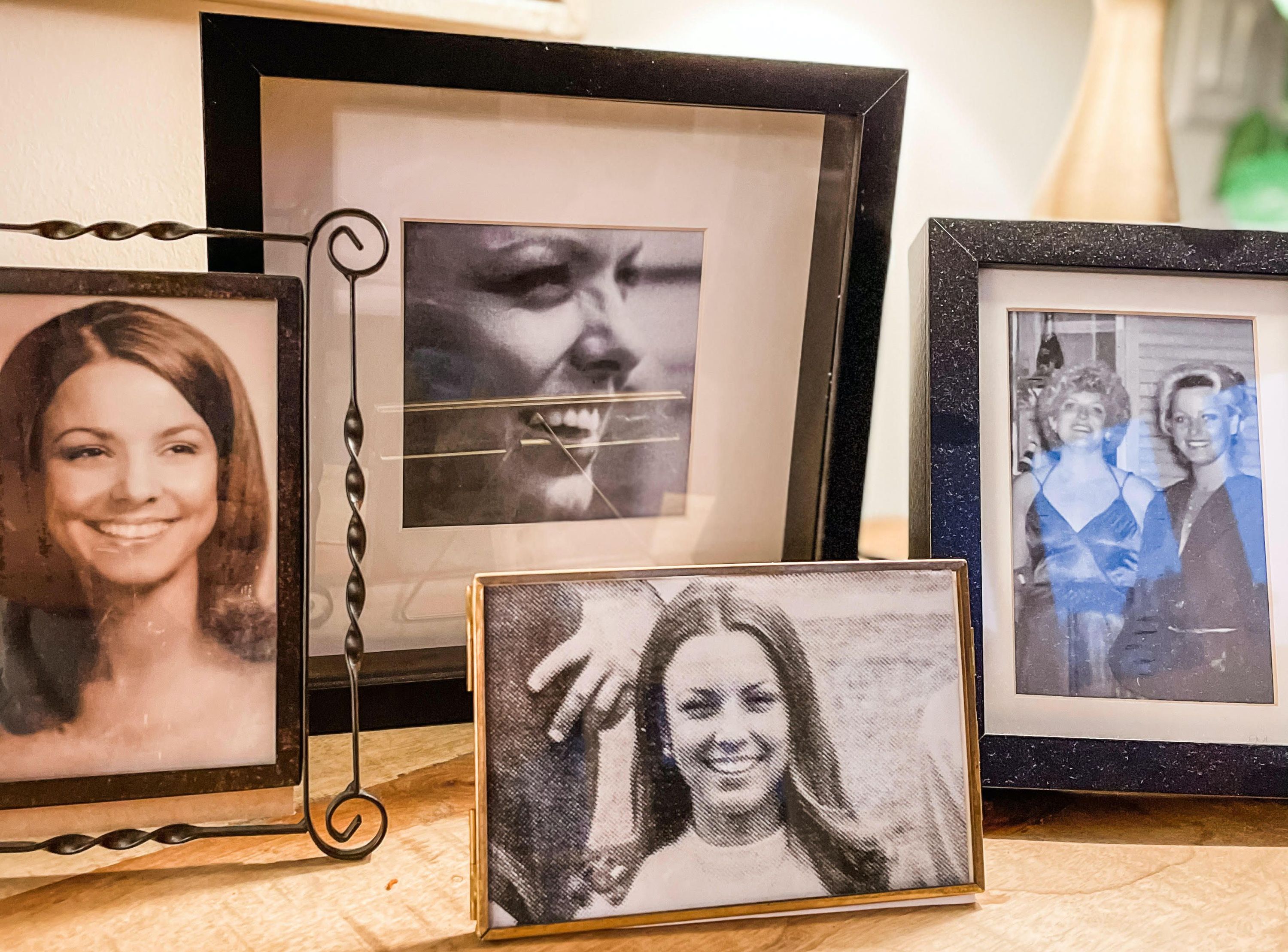 "This is my sideboard that I set up with pictures of my mom after she died. These are my absolute favorite photos of her and they remind me of her spirit before she ever got sick. My entire year was consumed with my grief about losing her. I remember." — Jesse Danville