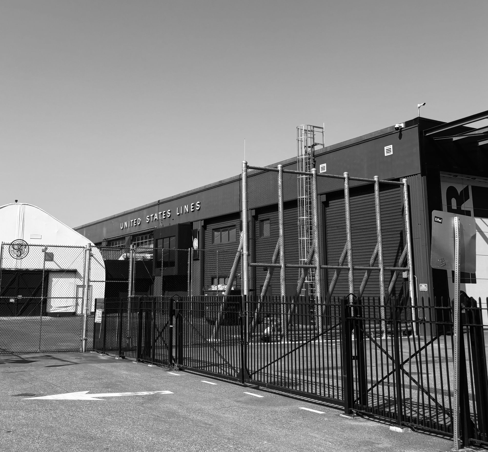Black and white photo of a facility that reads United States Lines.