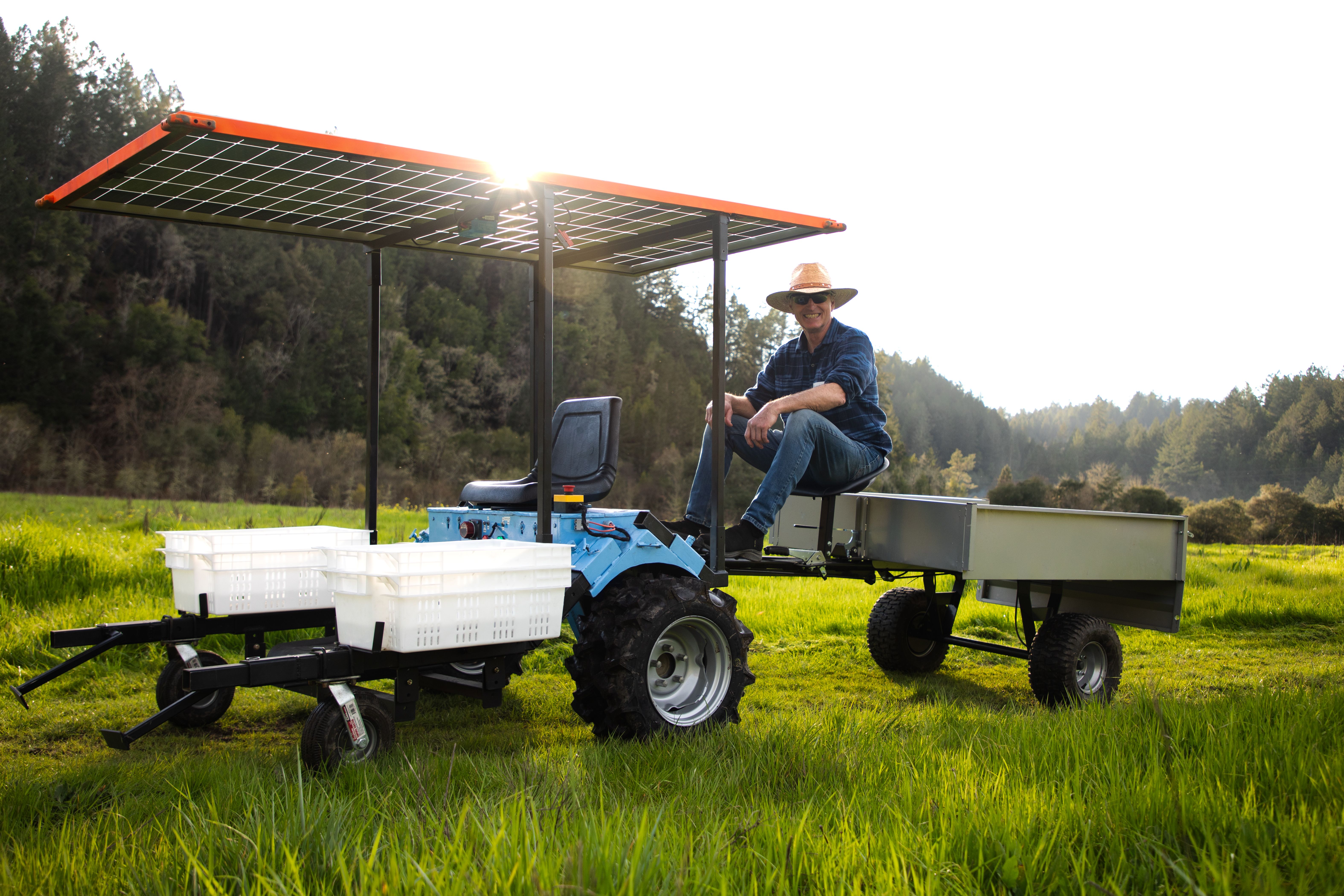 Renewables e2T electric tractor attached to a tiller