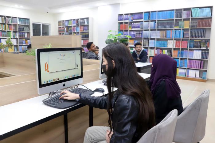 Students Studying in Library