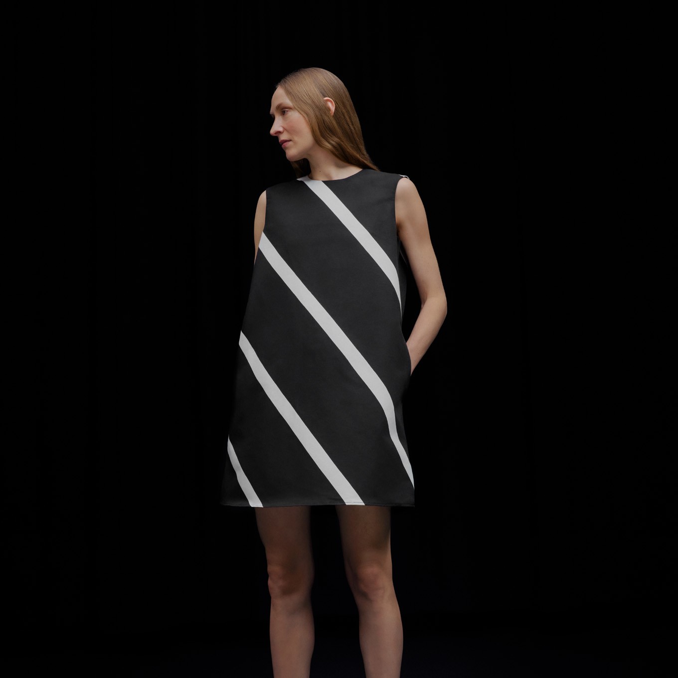 Model wearing a dress in Basso print.