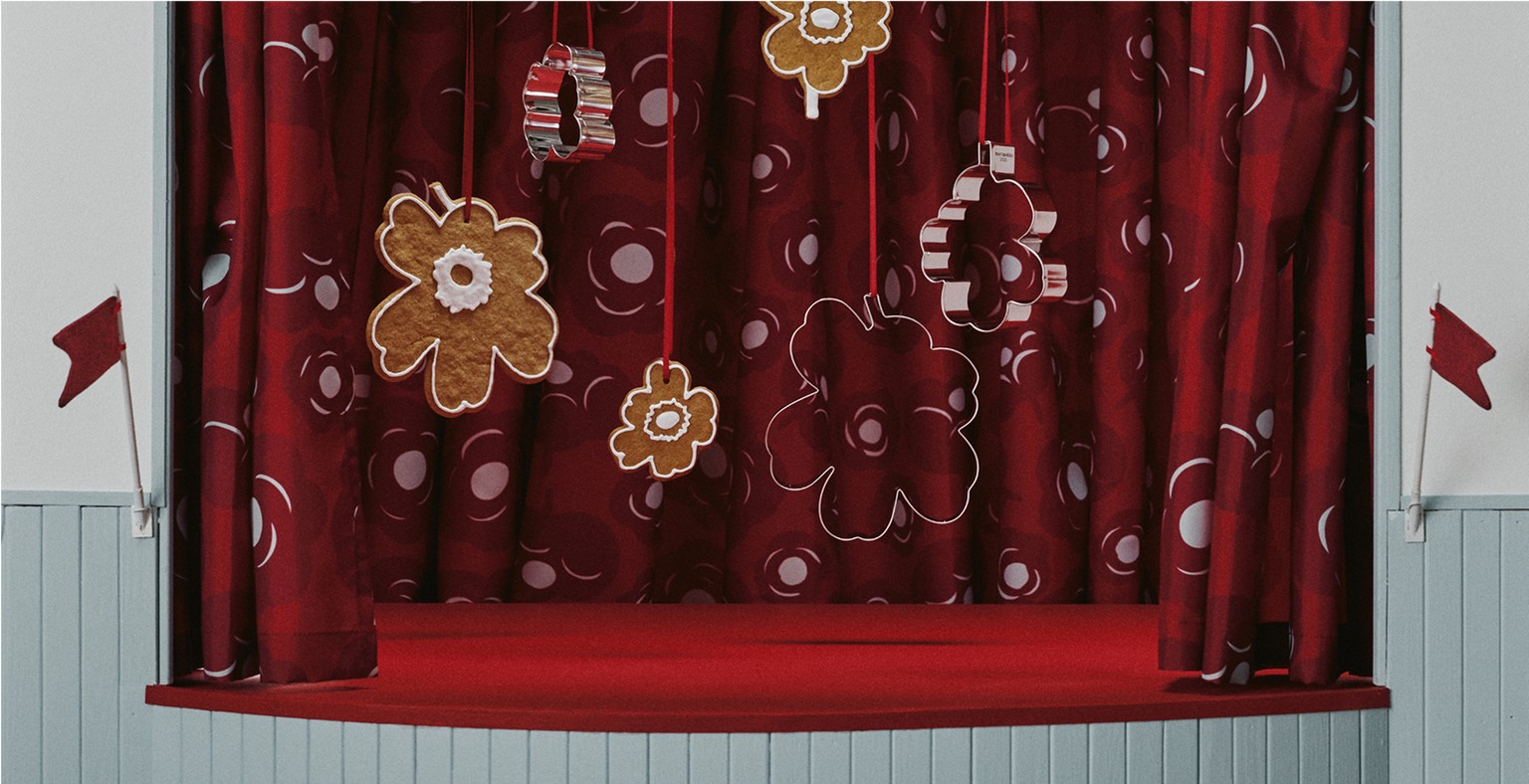 Unikko Cookies and cookie cutters hung on a stage.