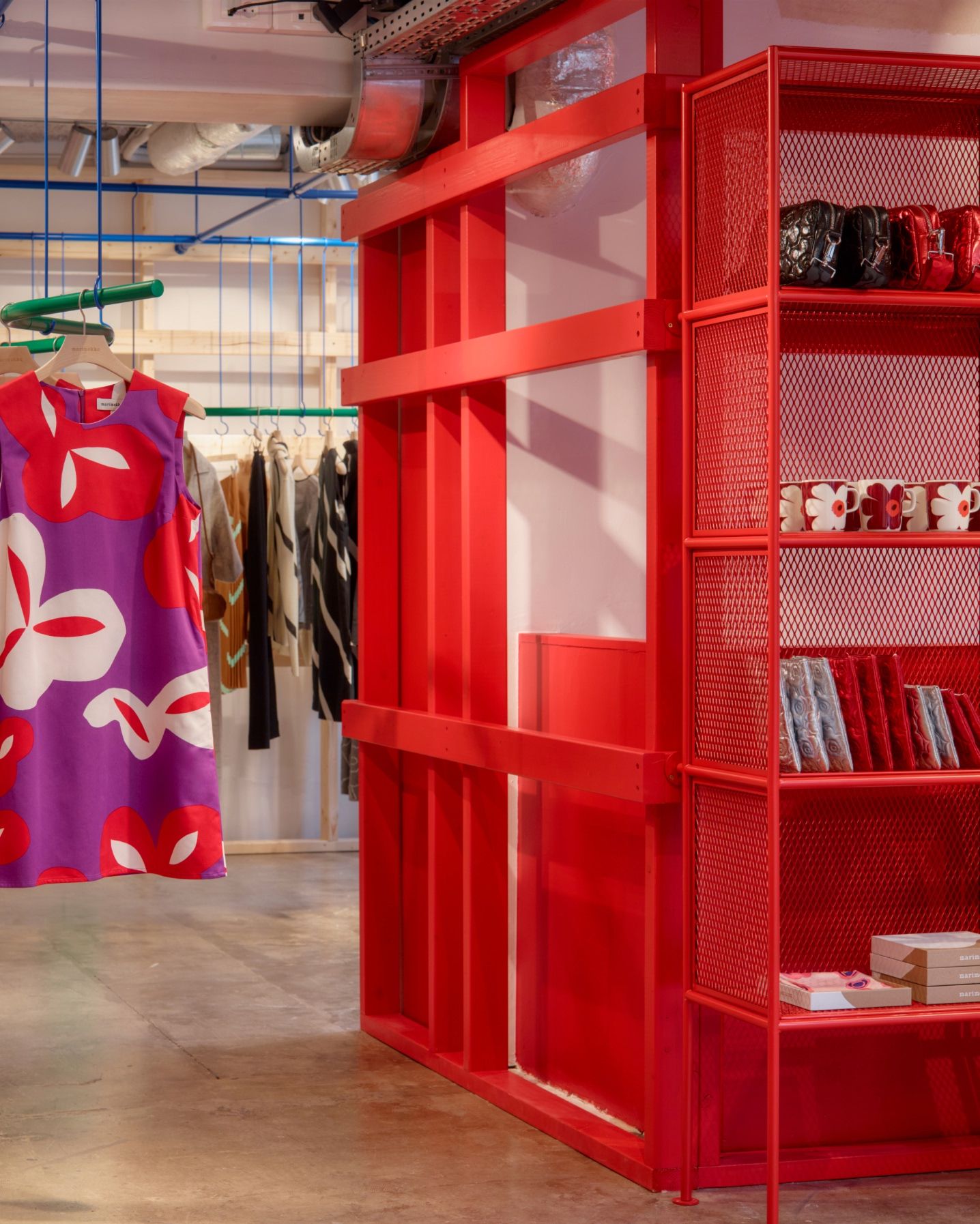 Siluetti Poiminto dress hanging in Marimekko Paris store.