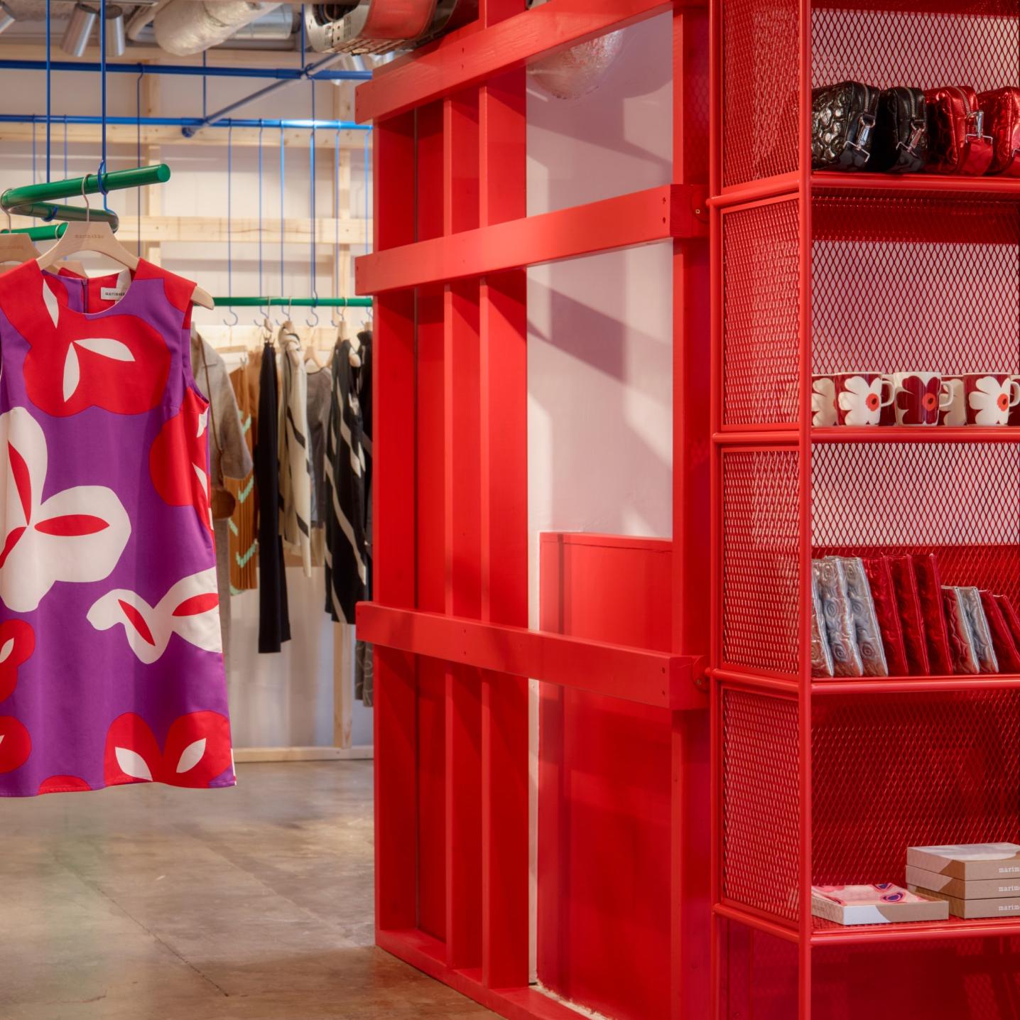 Siluetti Poiminto dress hanging in Marimekko Paris store.