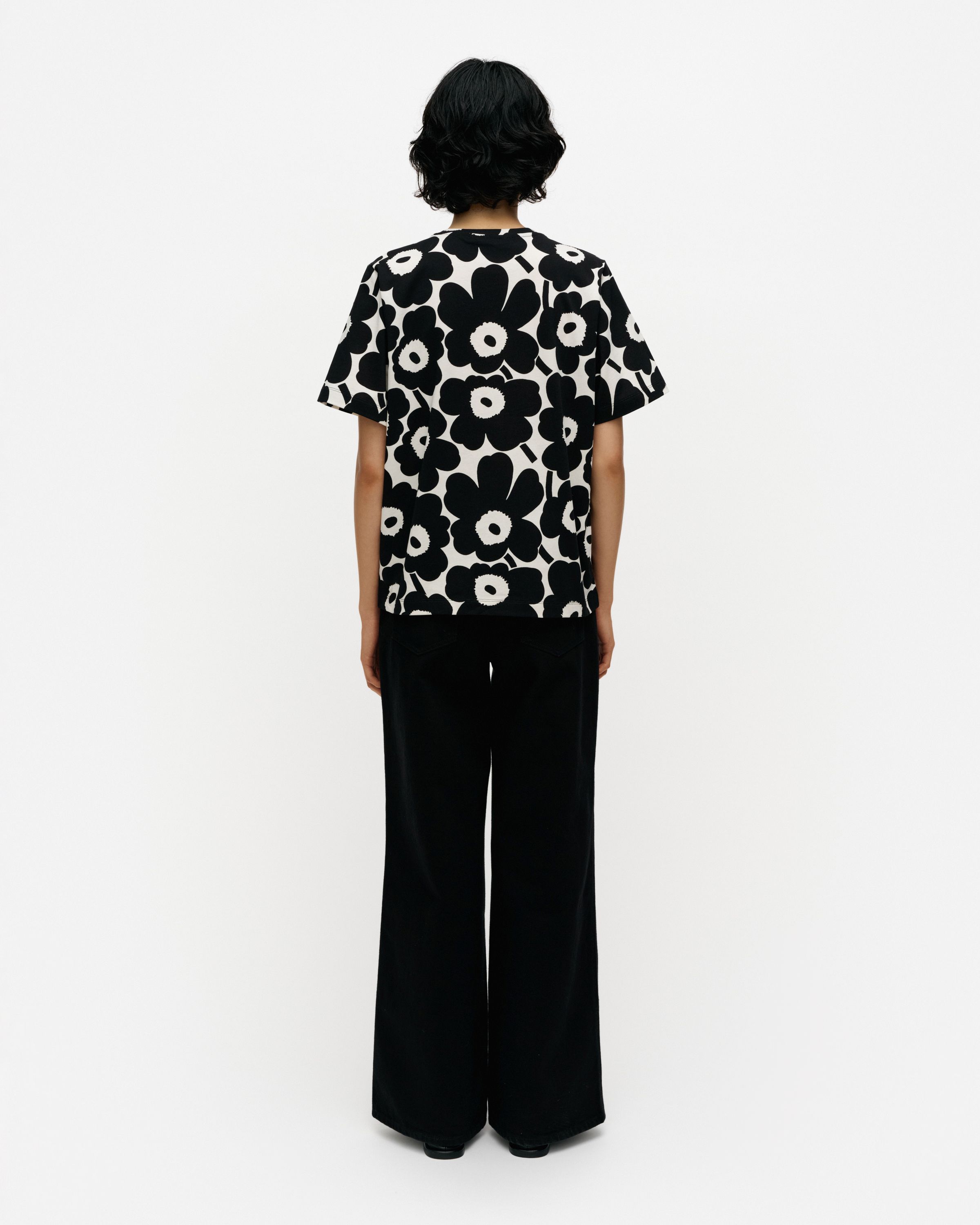 Tunnit Unikko t-shirt black, off white | Marimekko