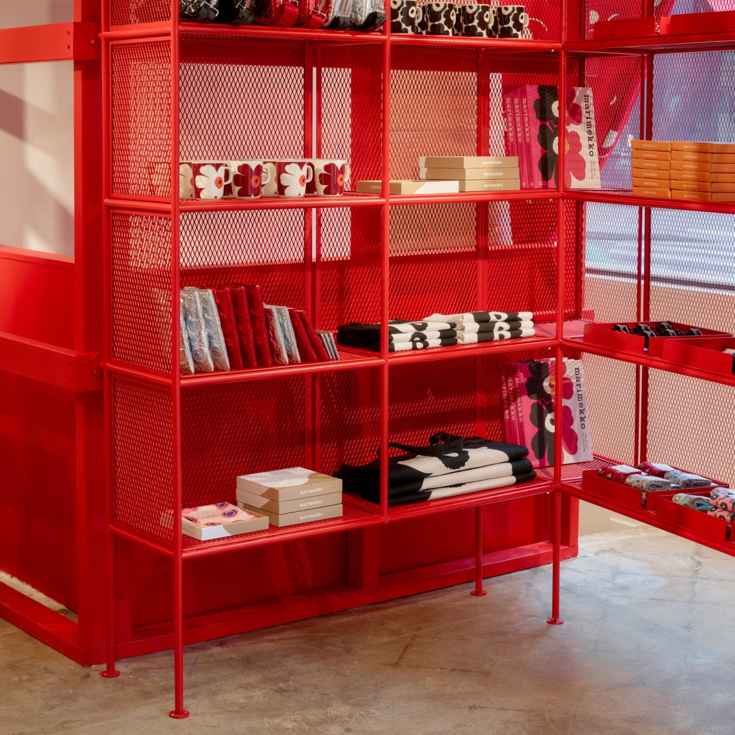 Display of Marimekko mugs and accessories.