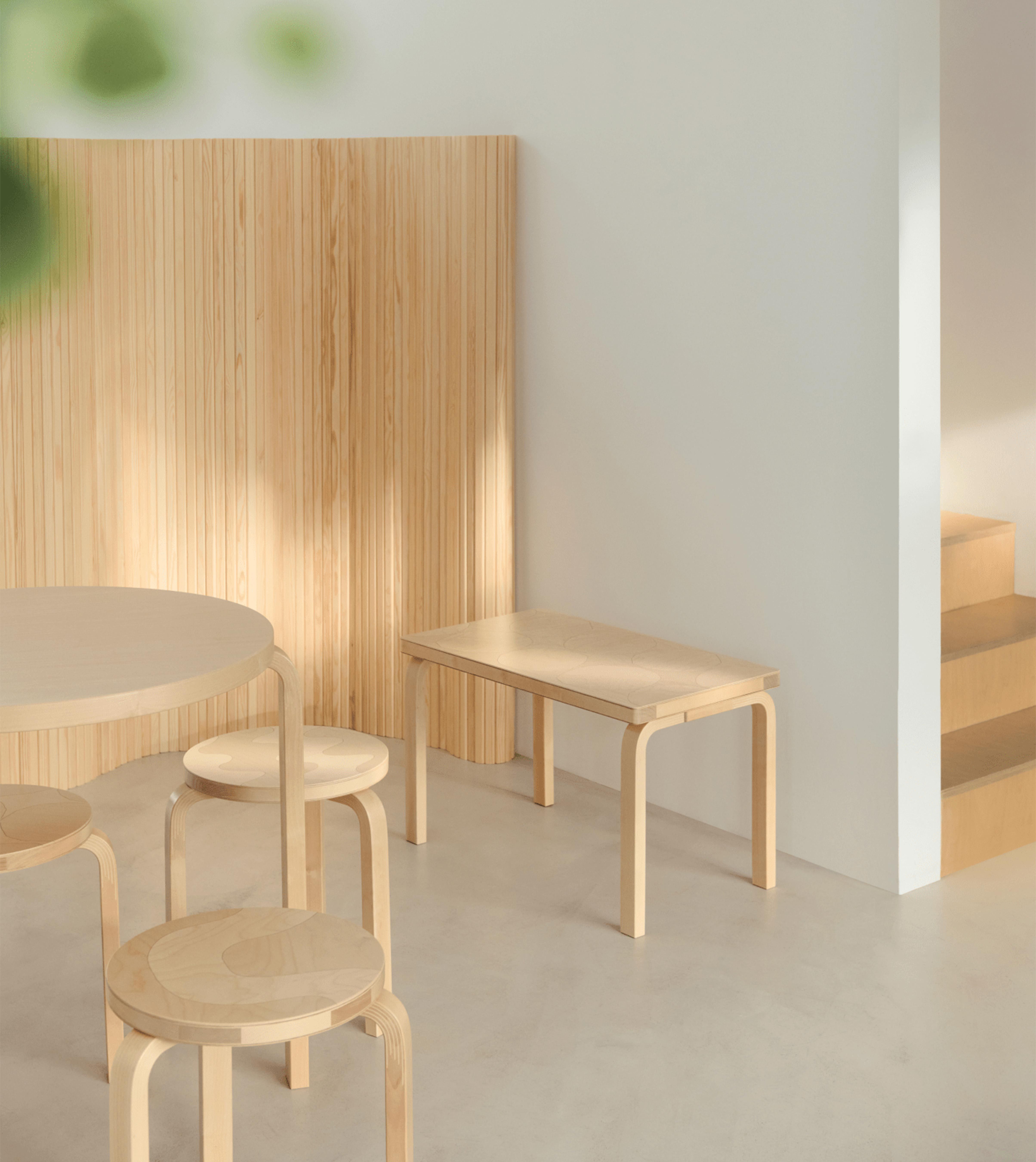 Table, stools and bench from the Artek + Marimekko collaboration.