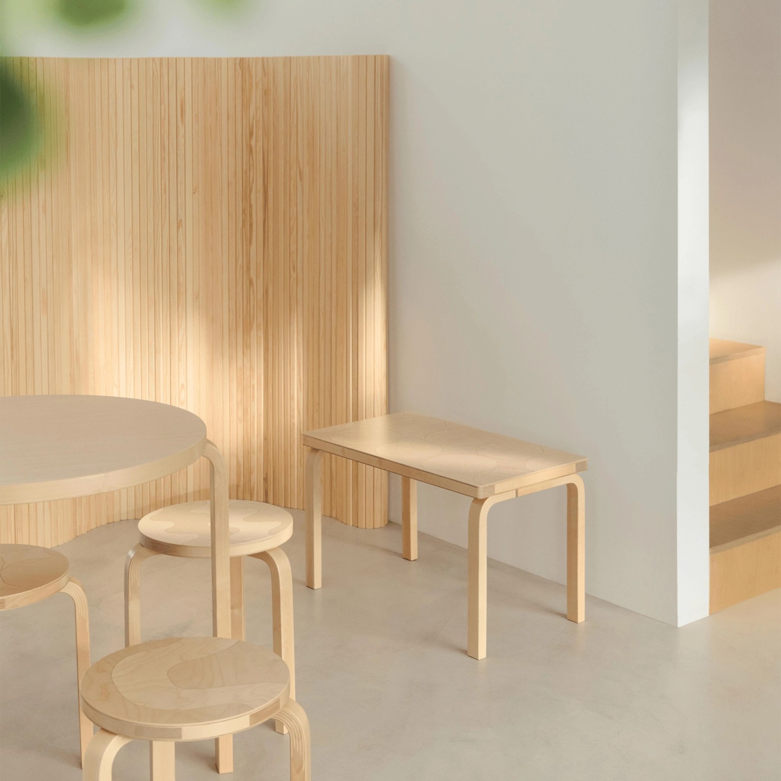 Table, stools and bench from the Artek + Marimekko collaboration.