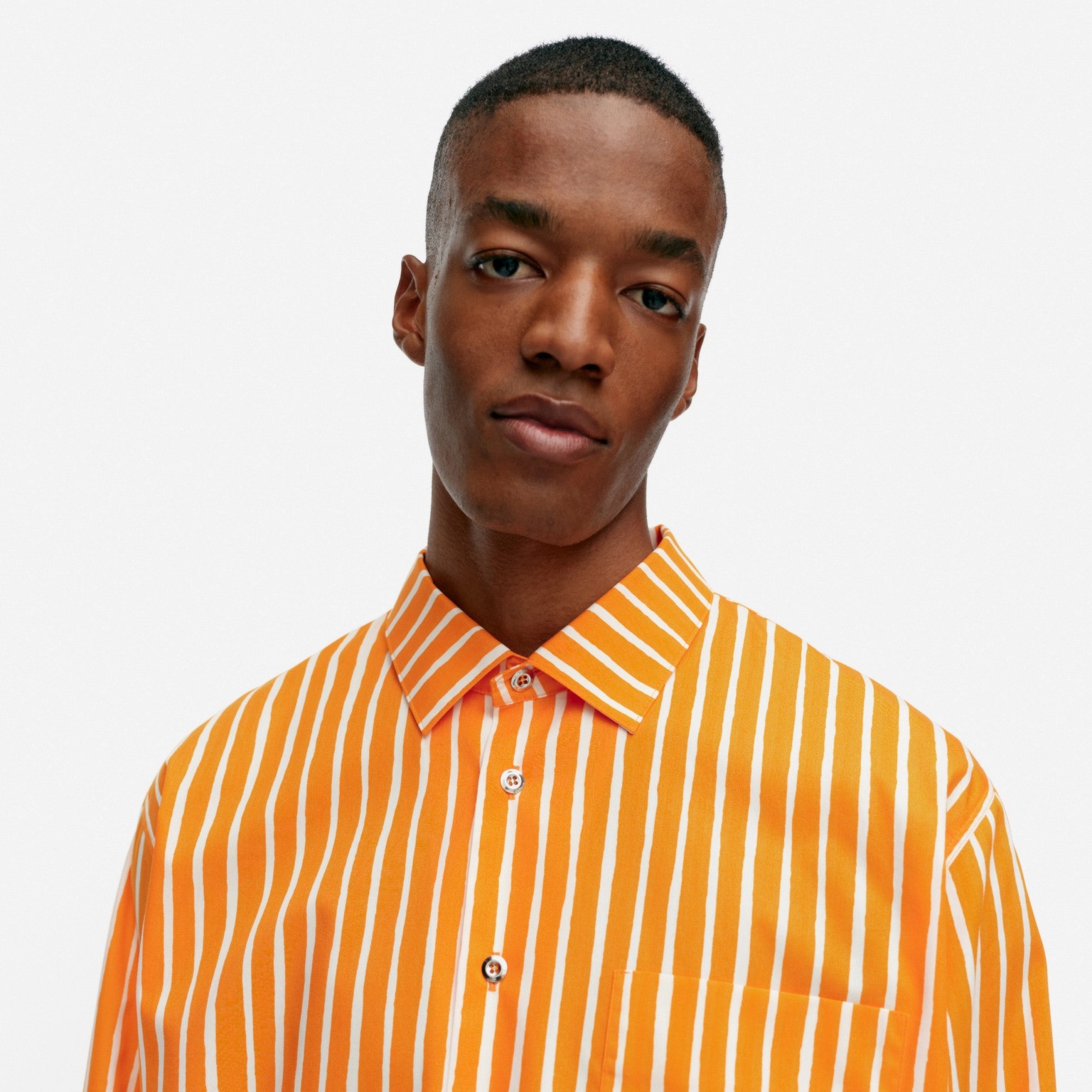 Model wearing Jokapoika shirt.