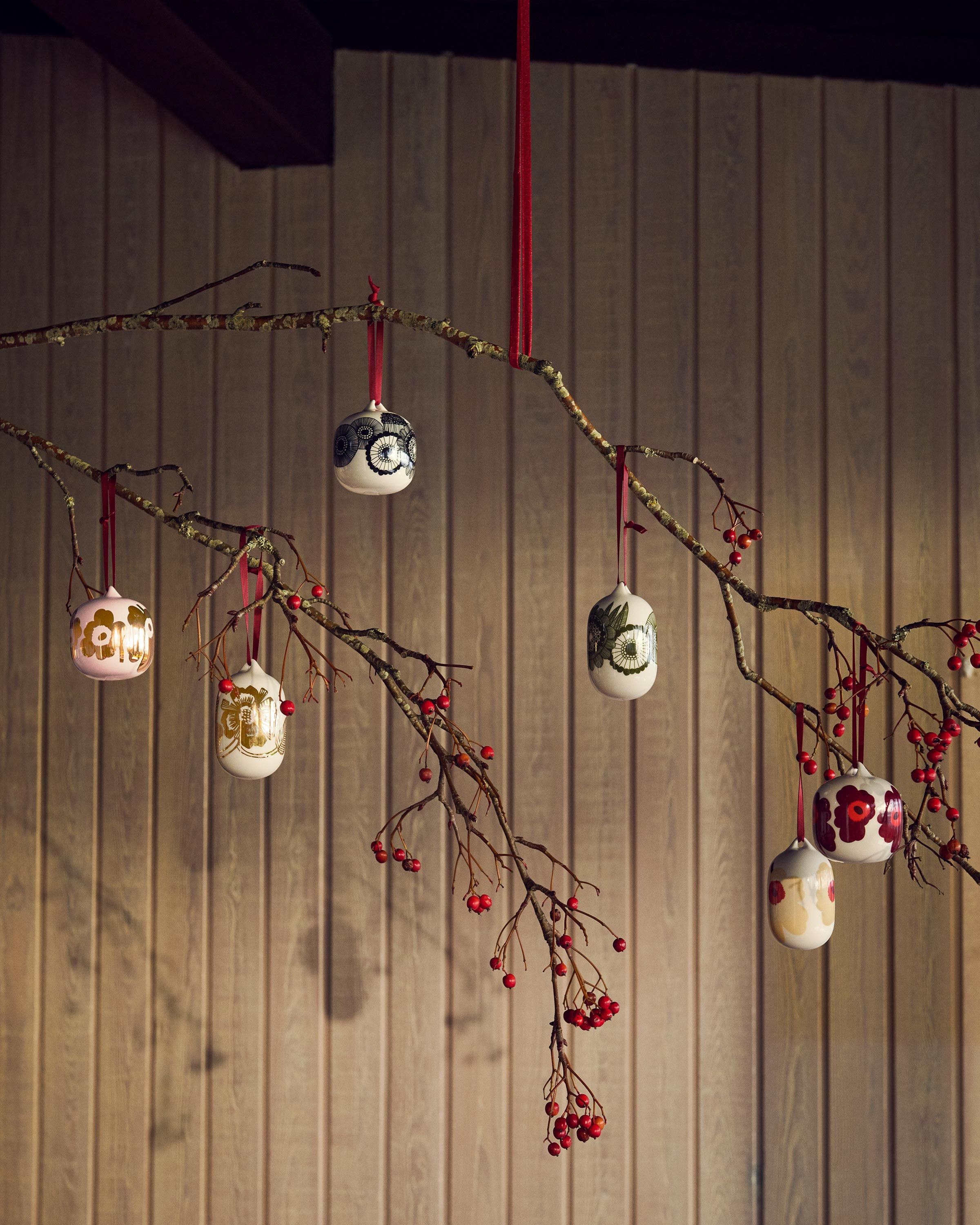 Ornaments in Unikko and Siirtolapuutarha pattern.