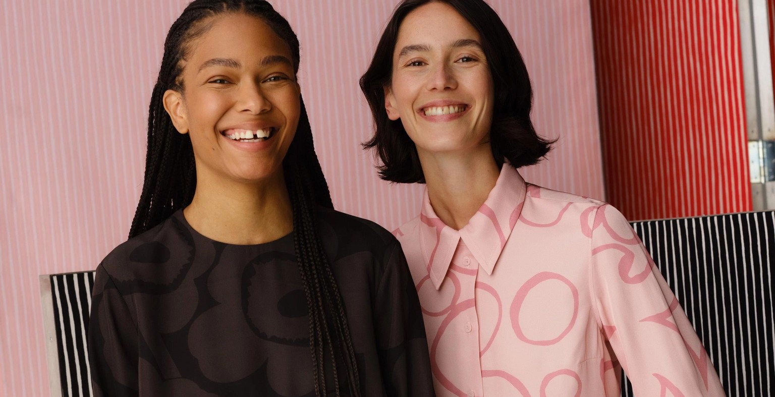 Models wearing a black Hienous dress in Unikko print and a pink set in Keidas print.