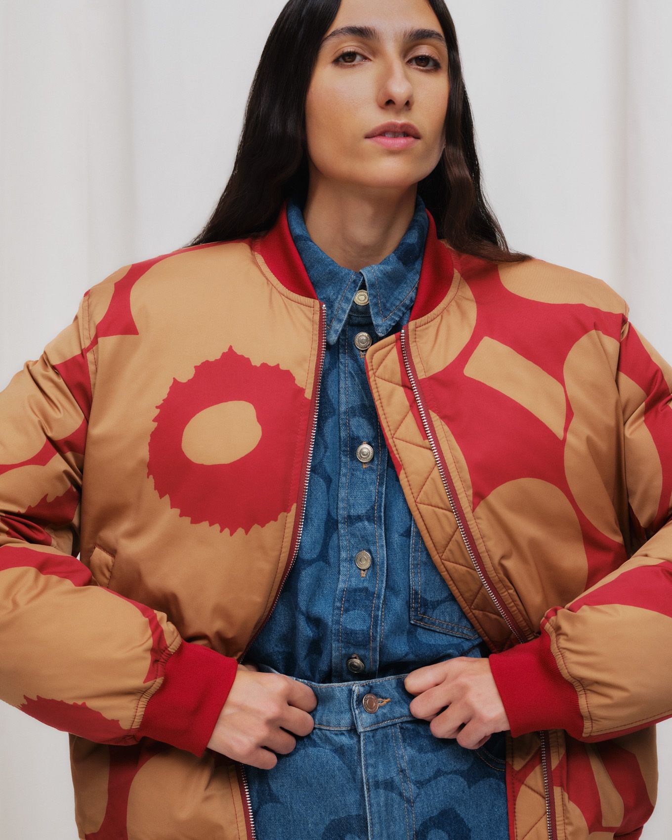 Model wearing Maridenim and coat in Unikko print.