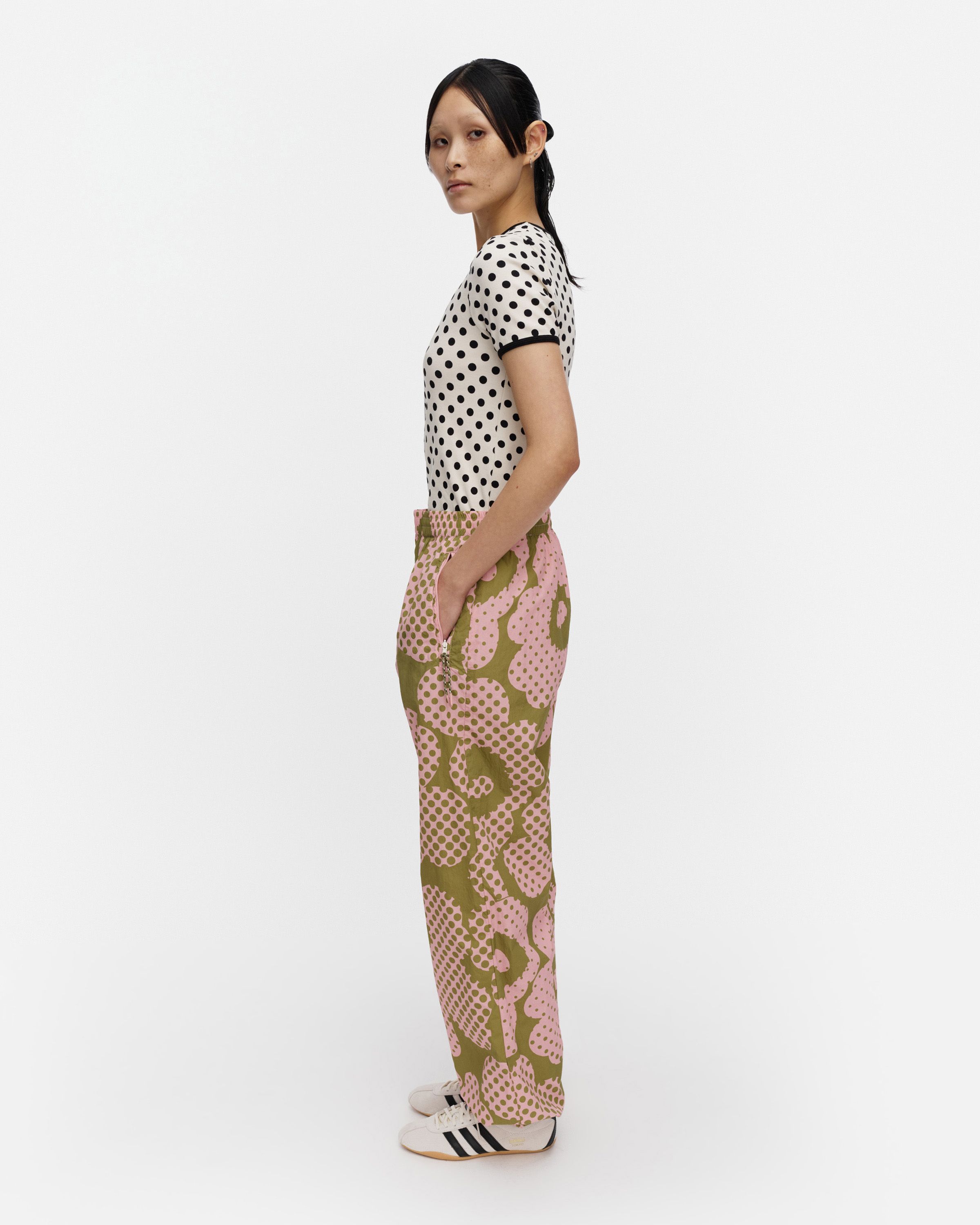 Olos Unikko Kioski activewear trousers green, light pink | Marimekko