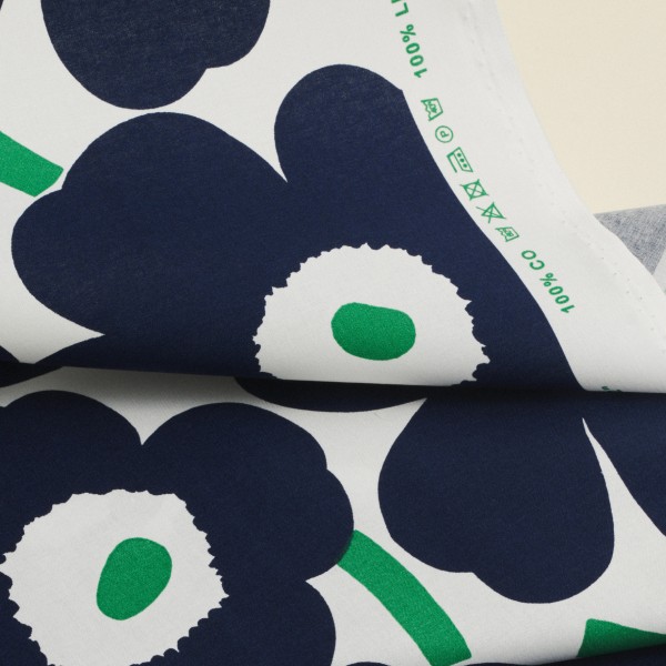 Fabric with Unikko pattern printed with marine biomass