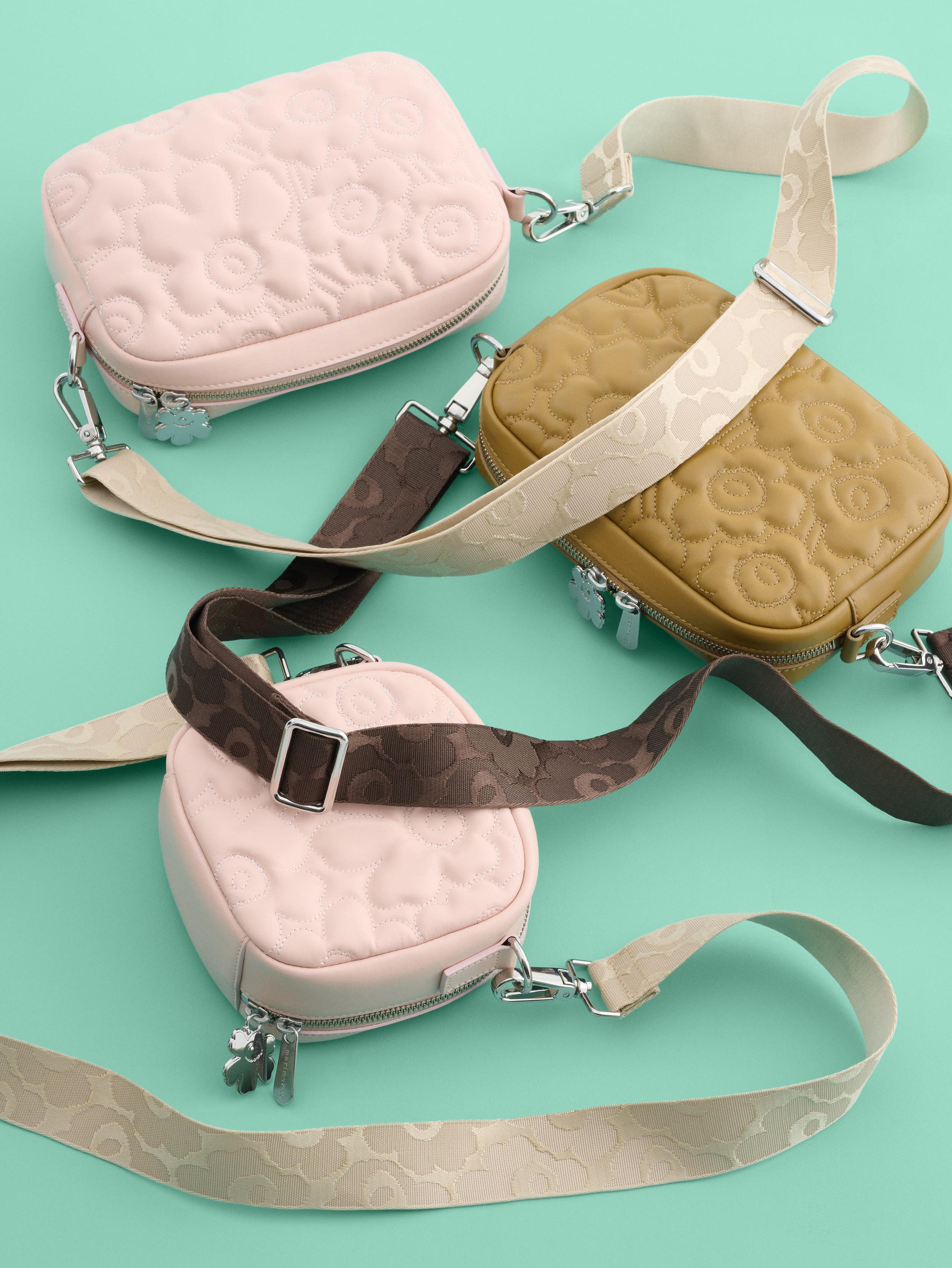 Two pink and one light brown Gratha bags.