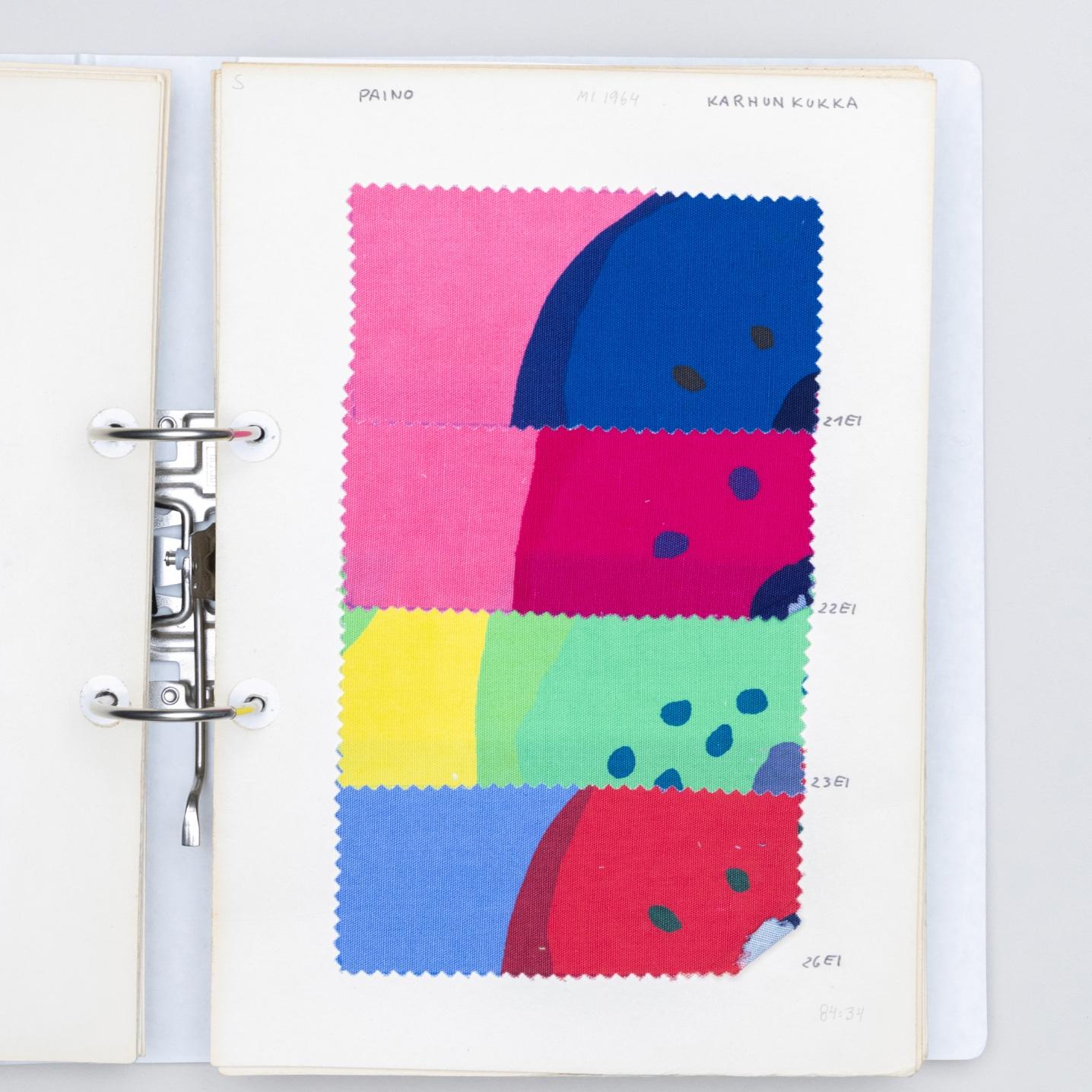 Folder with patched of colorful fabric.