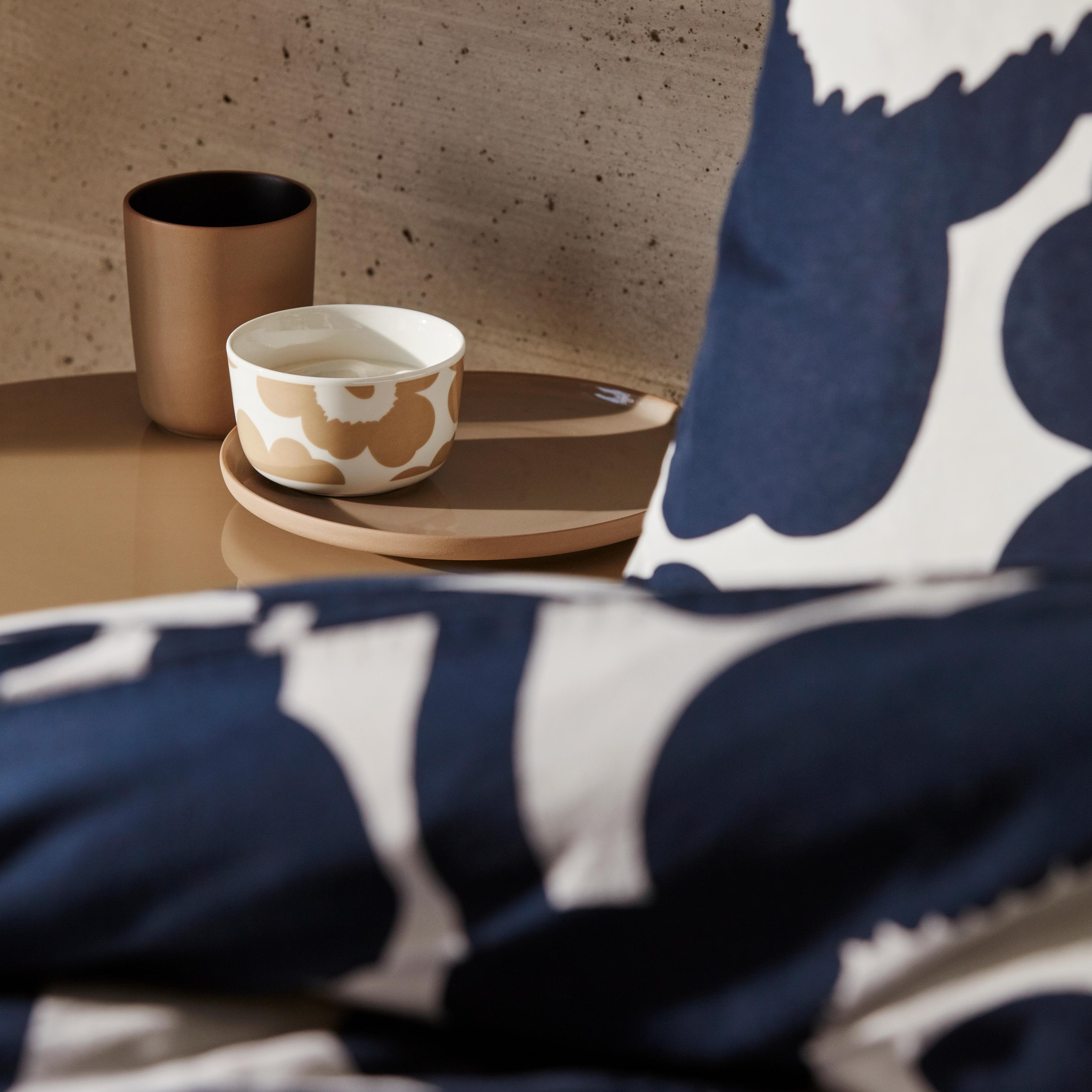 Oiva dining set and bed linen in Unikko pattern