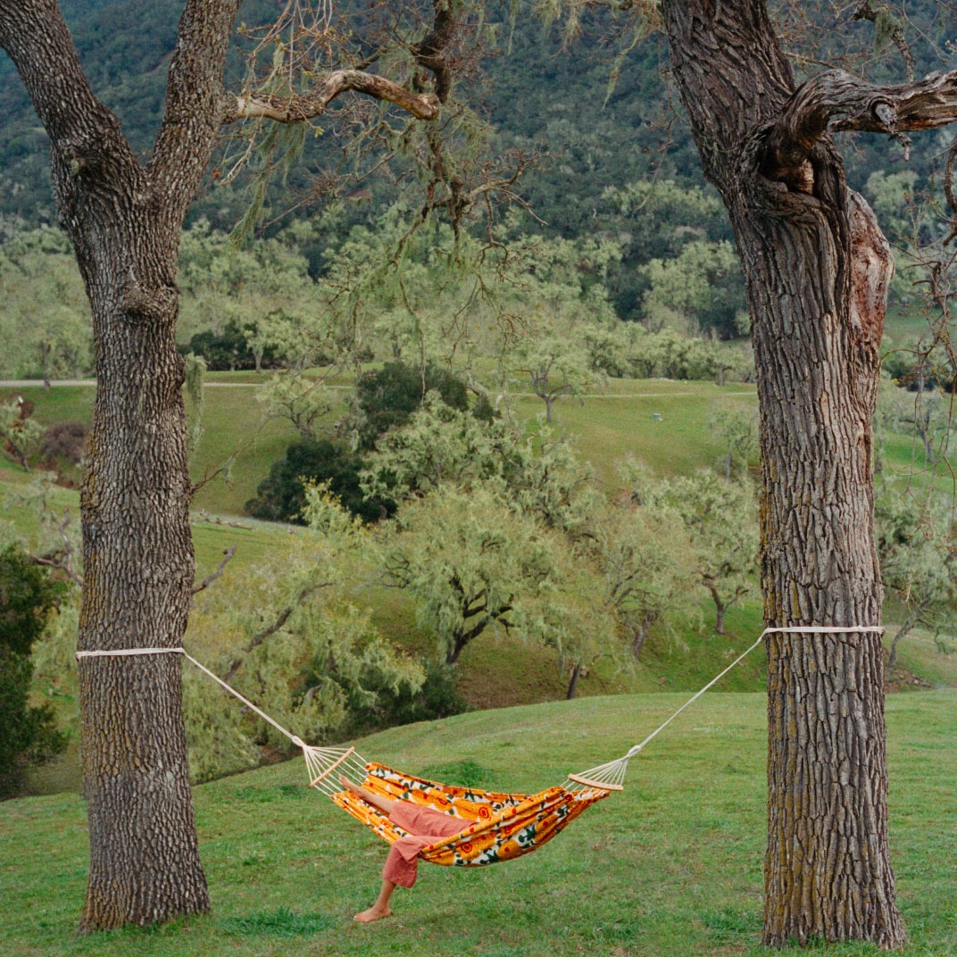 West Elm and Marimekko collaboration hammock in orange