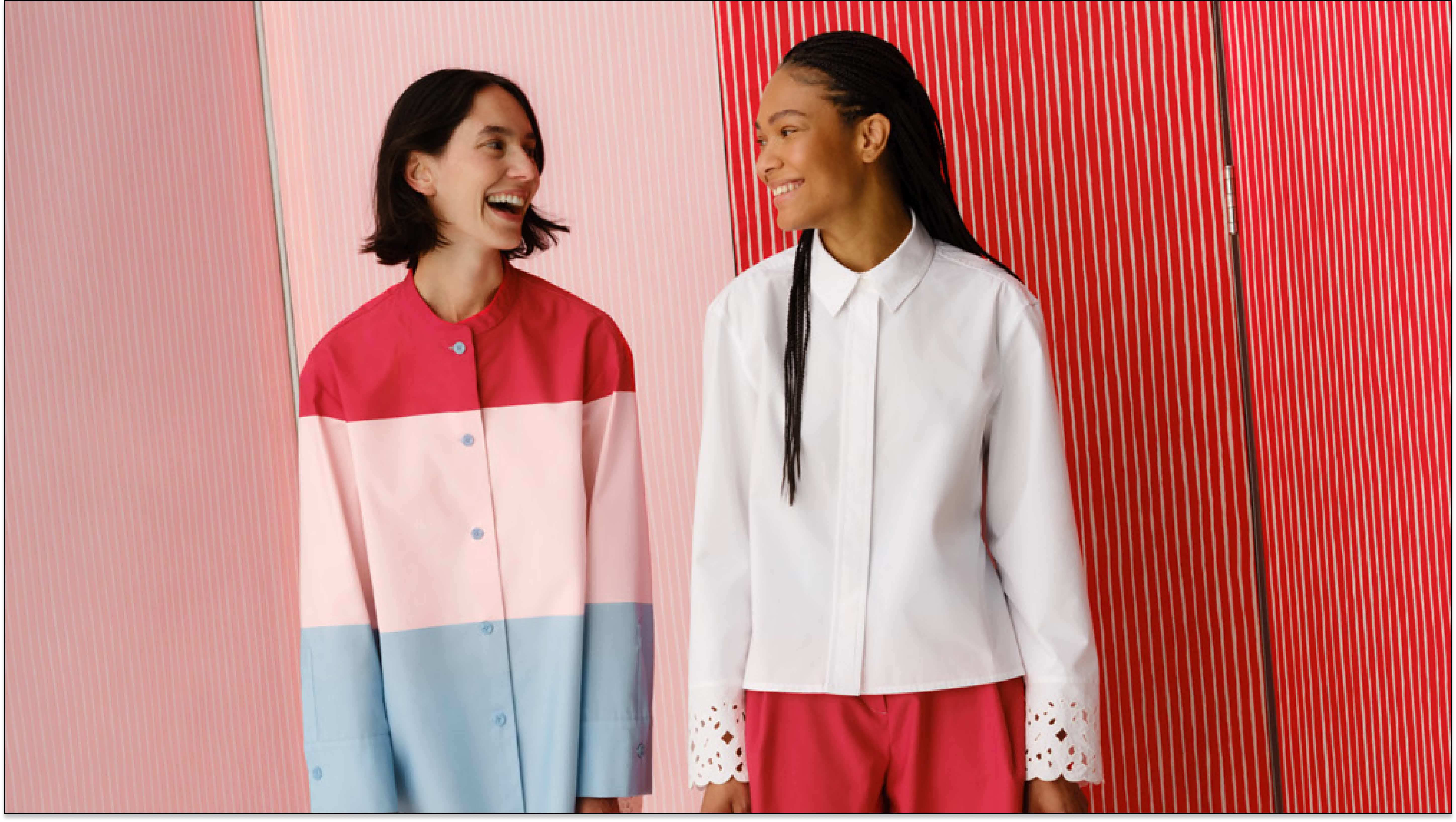 Models wearing a dress in Hennika print and shirt with Keidas embroidery.