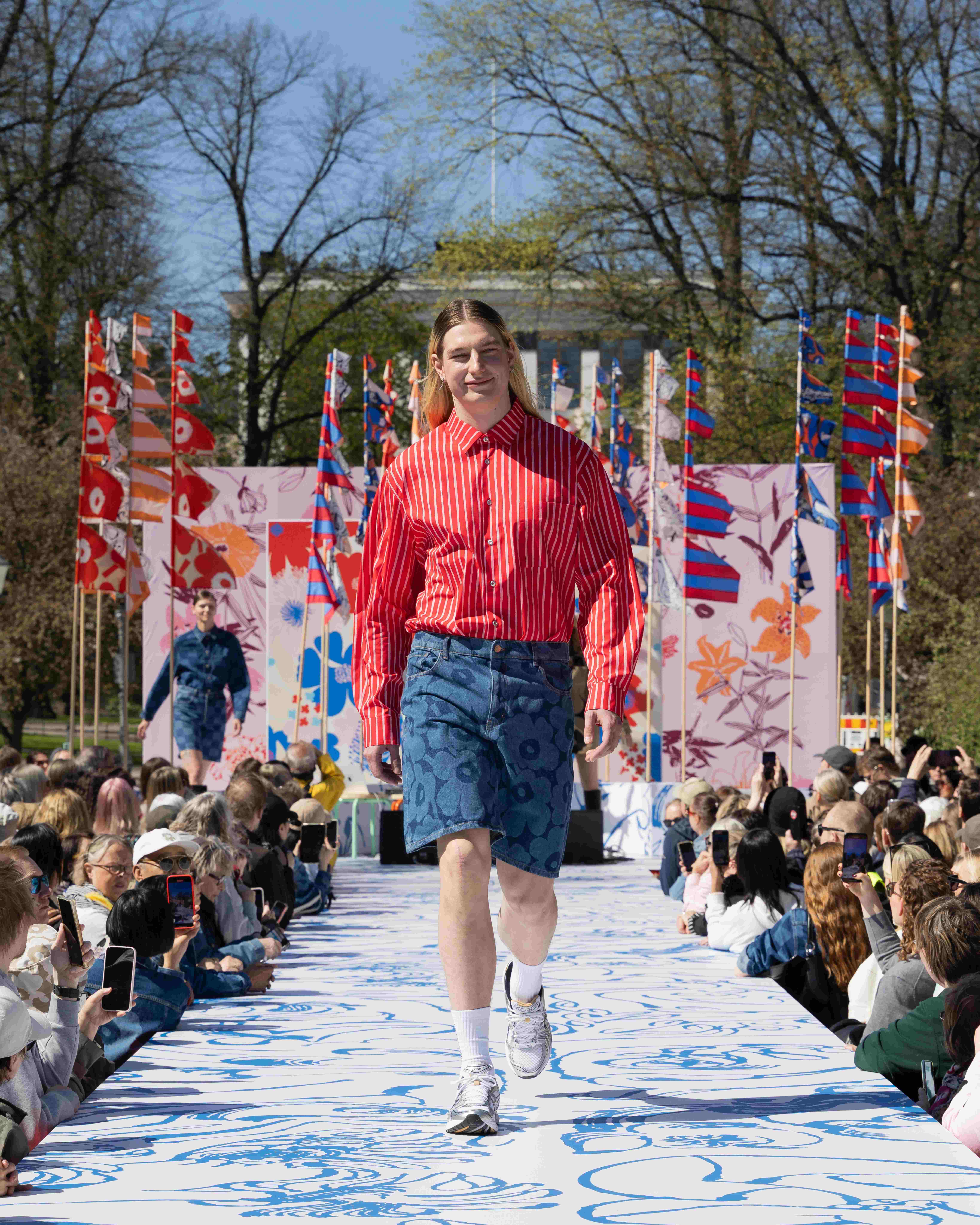 Model wearing Jokapoika shirt and Maridenim shorts.