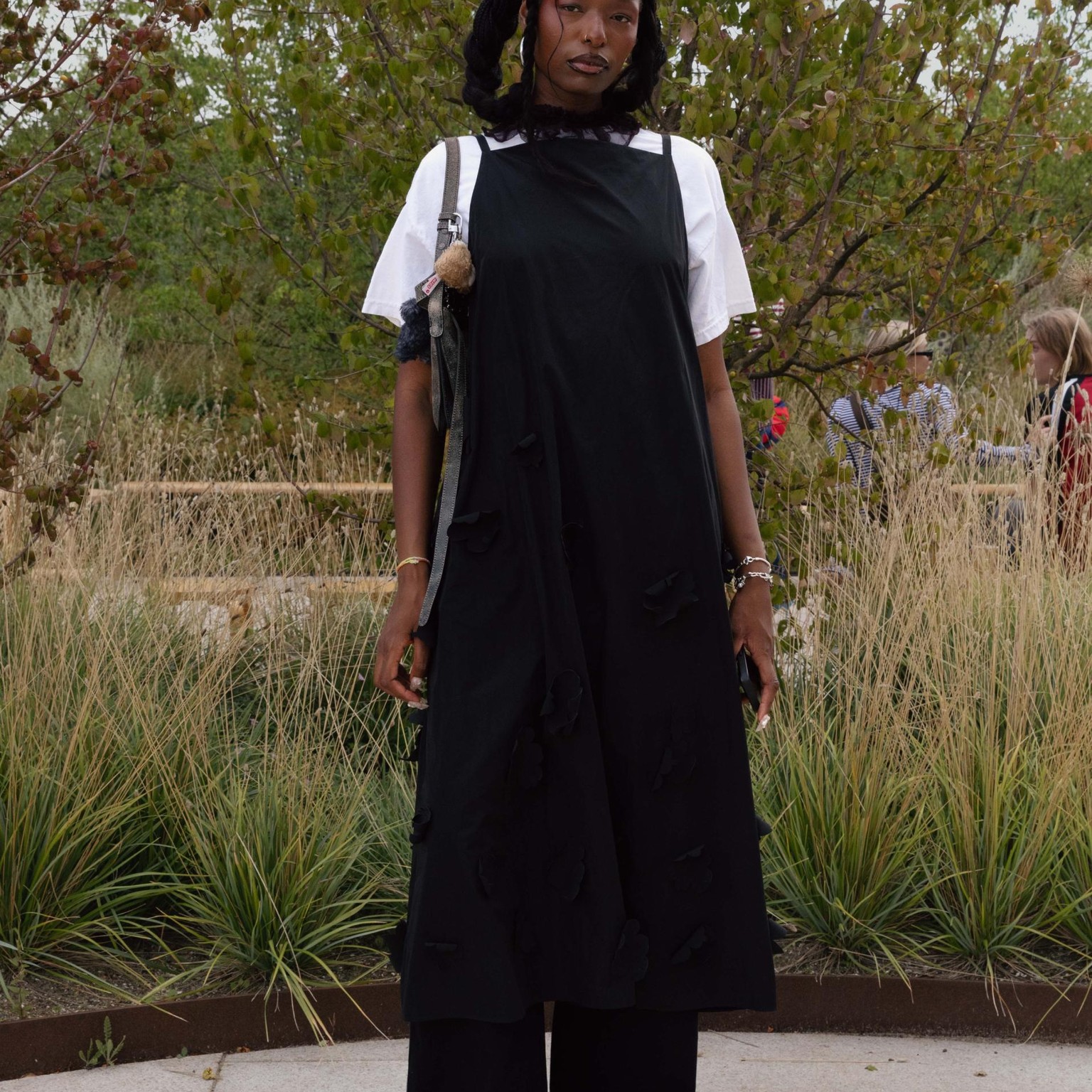 Jessi Reginan wearing black Marimekko dress and white t-shirt.